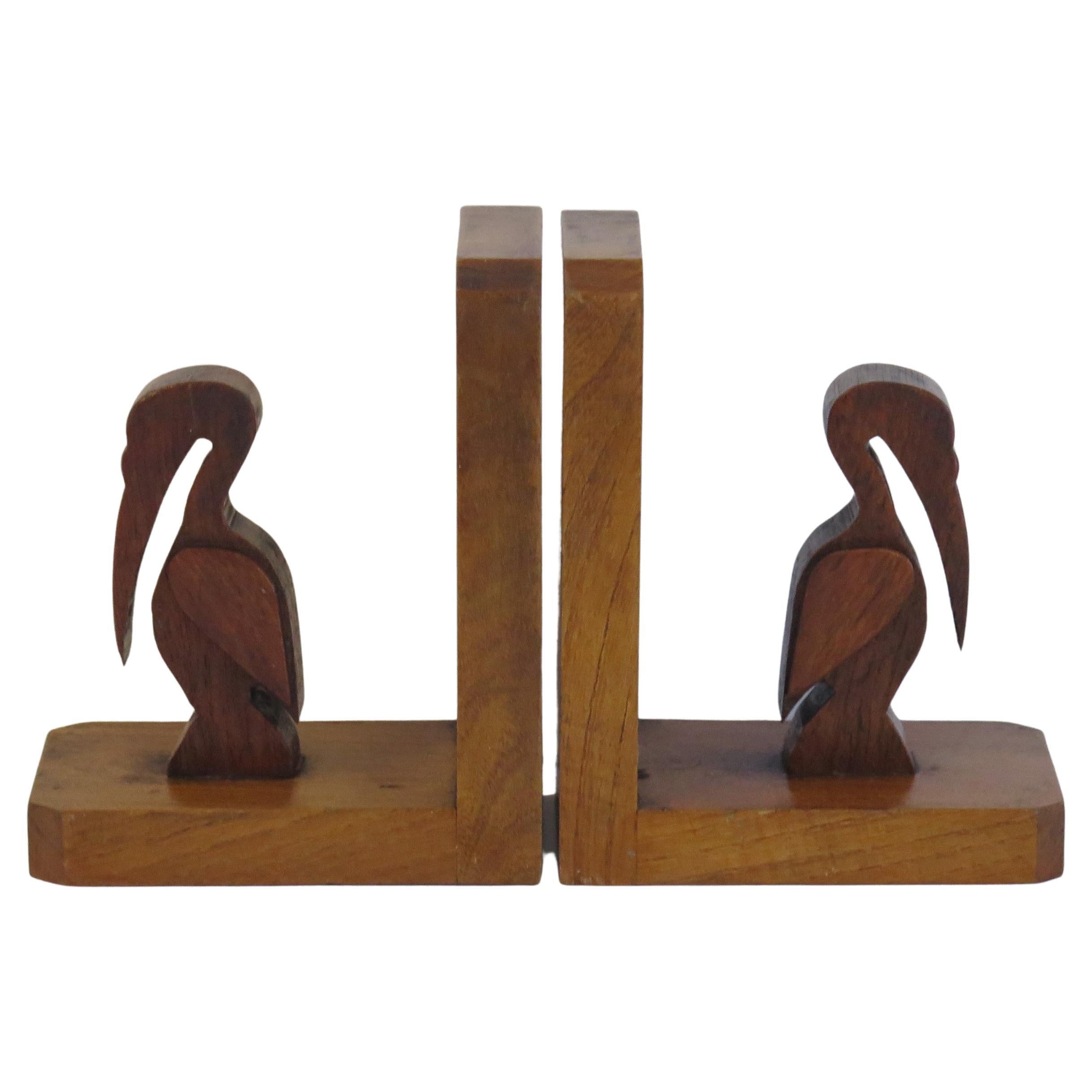 Art Deco Pair of Pelican Figure Bookends in Hand Carved Woods, circa 1930 For Sale