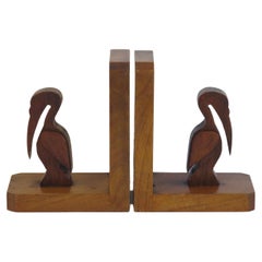 Art Deco Pair of Pelican Figure Bookends in Hand Carved Woods, circa 1930