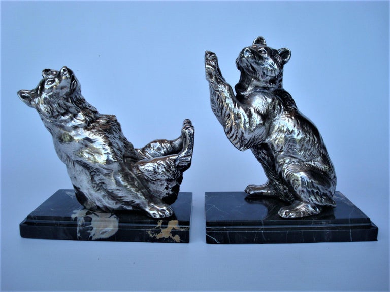 Emile Joseph Nestor Carlier (French, 1849-1927) Art Deco Pair of Silvered Metal Playing Bears Bookends. Each with impressed “FABRICATION FRANCAIS PARIS” foundry mark. Made in France, 1920´s.
