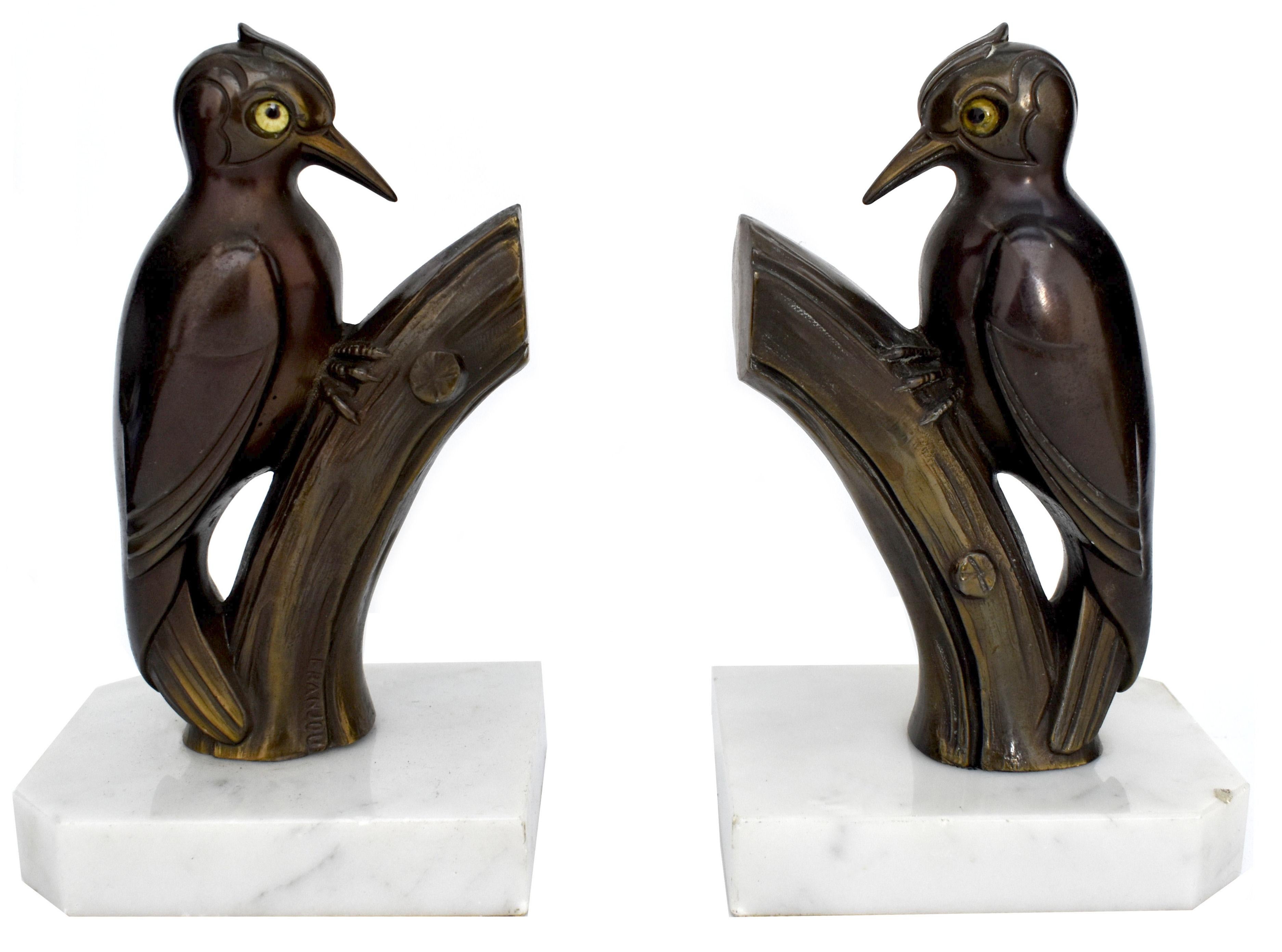 silver bookends in the shape of a single wing