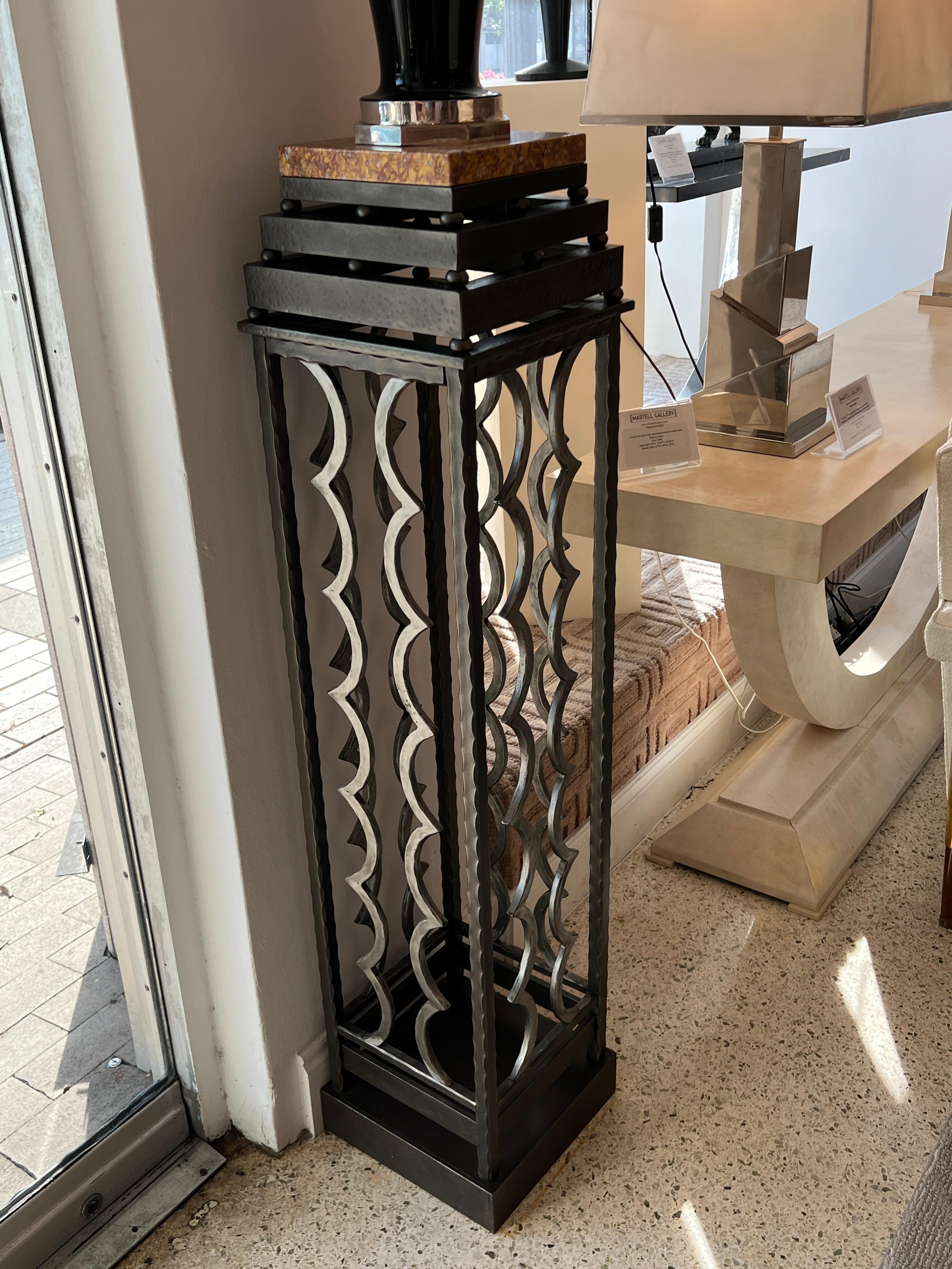 Pair of Wrought Iron pedestals with an Art Deco flair. Marble Top.