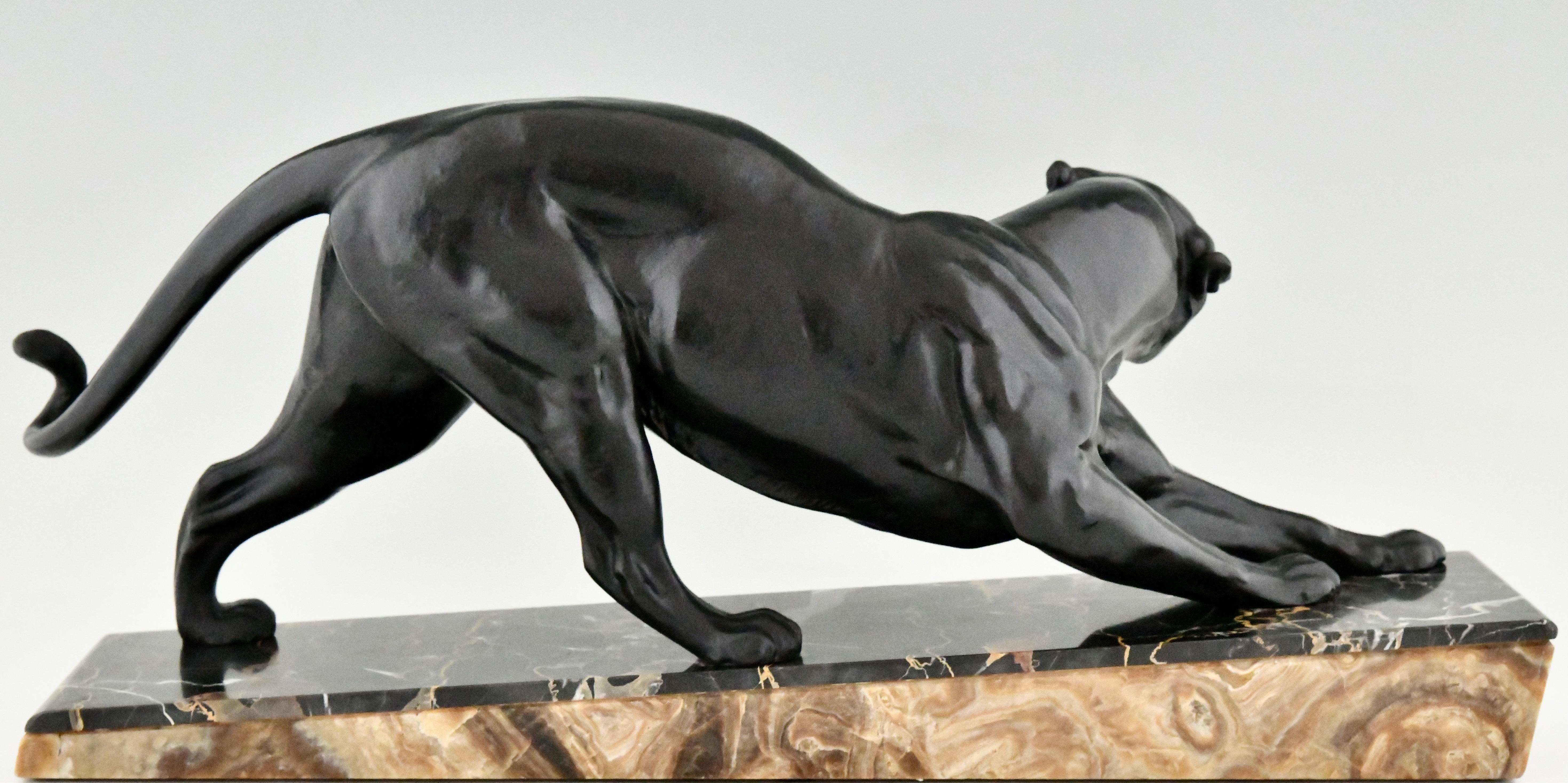 mirrored panther statue