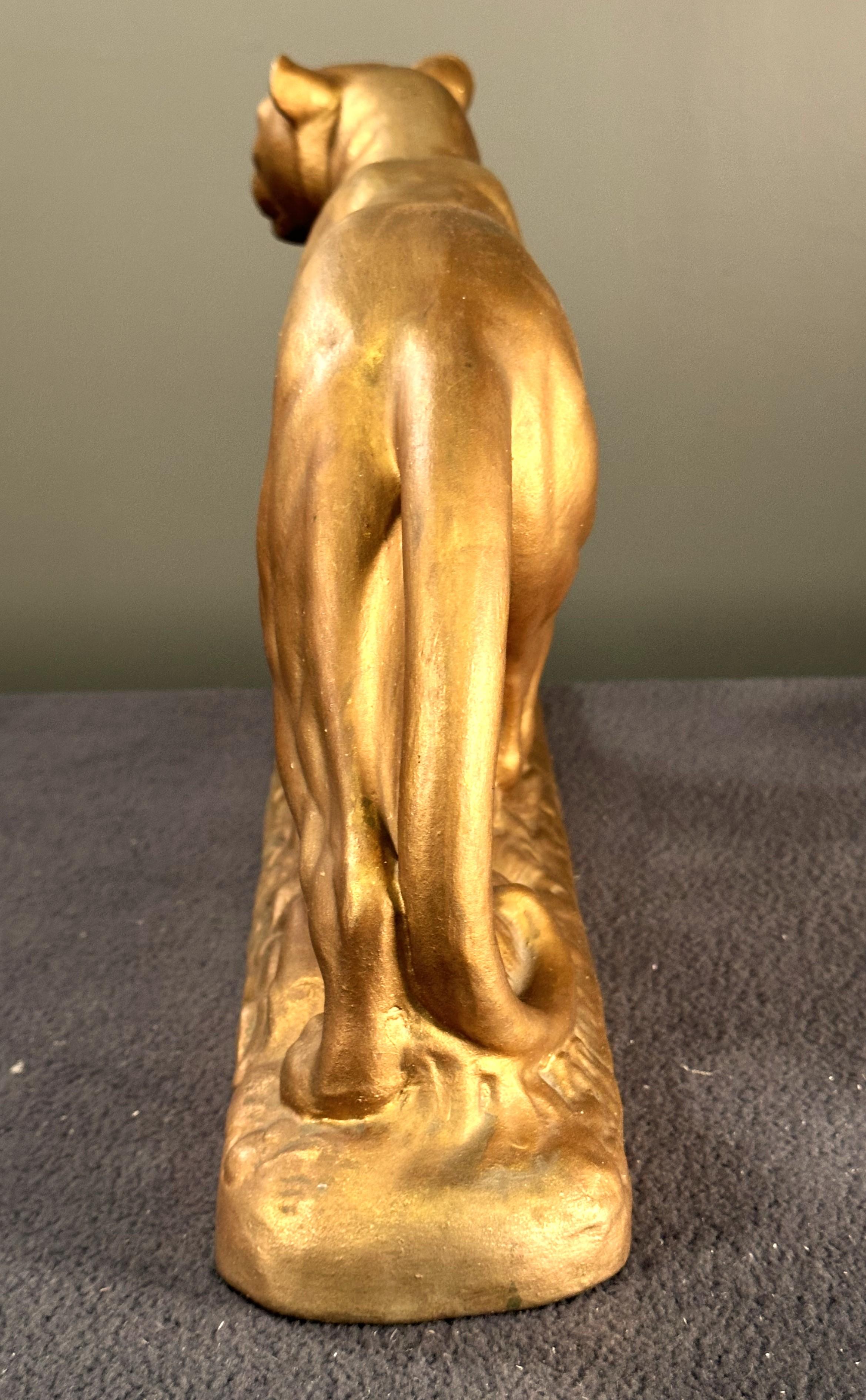 Escultura Art Decó pantera
Cerámica dorada patinada.
Francia 1935