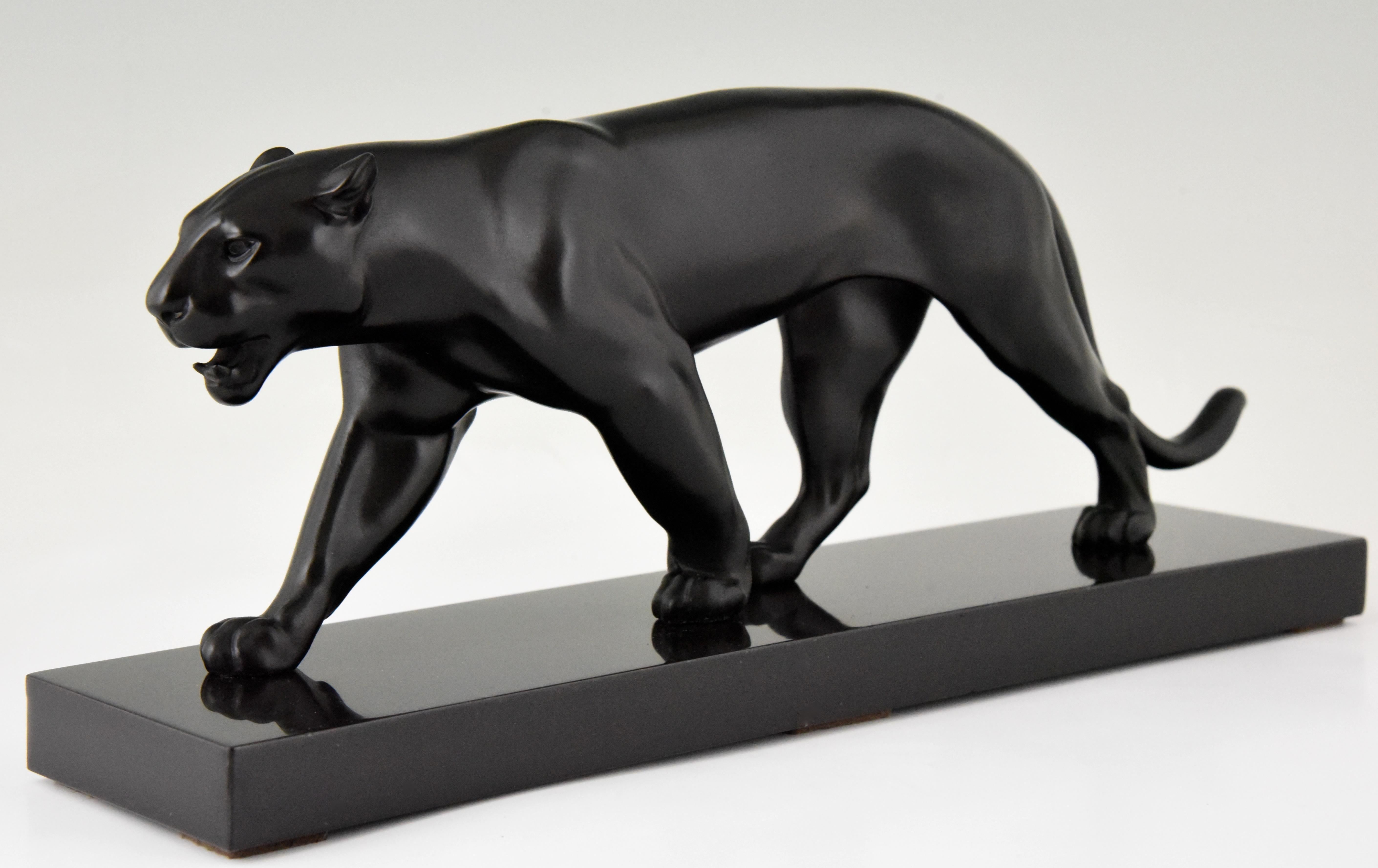 Art Deco sculpture of a walking panther by the famous French artist Max Le Verrier. Patinated art metal on a Belgian black marble base, circa 1930. 

“Statuettes of the Art Deco period” Alberto Shayo. ?“Art Deco sculpture” by Victor Arwas,