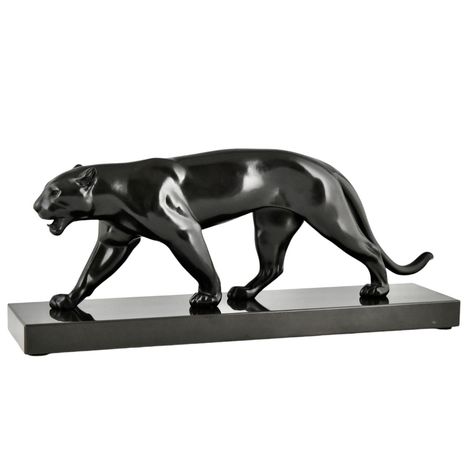 Art Deco panther sculpture OUGANDA by Max Le Verrier.
Signed M. Le Verrier 
France 1930 original cast of the Art Deco period.
Patinated Art Metal on black marble base. 
 With Certificate of Authenticity.

This sculpture is illustrated in:
Max le