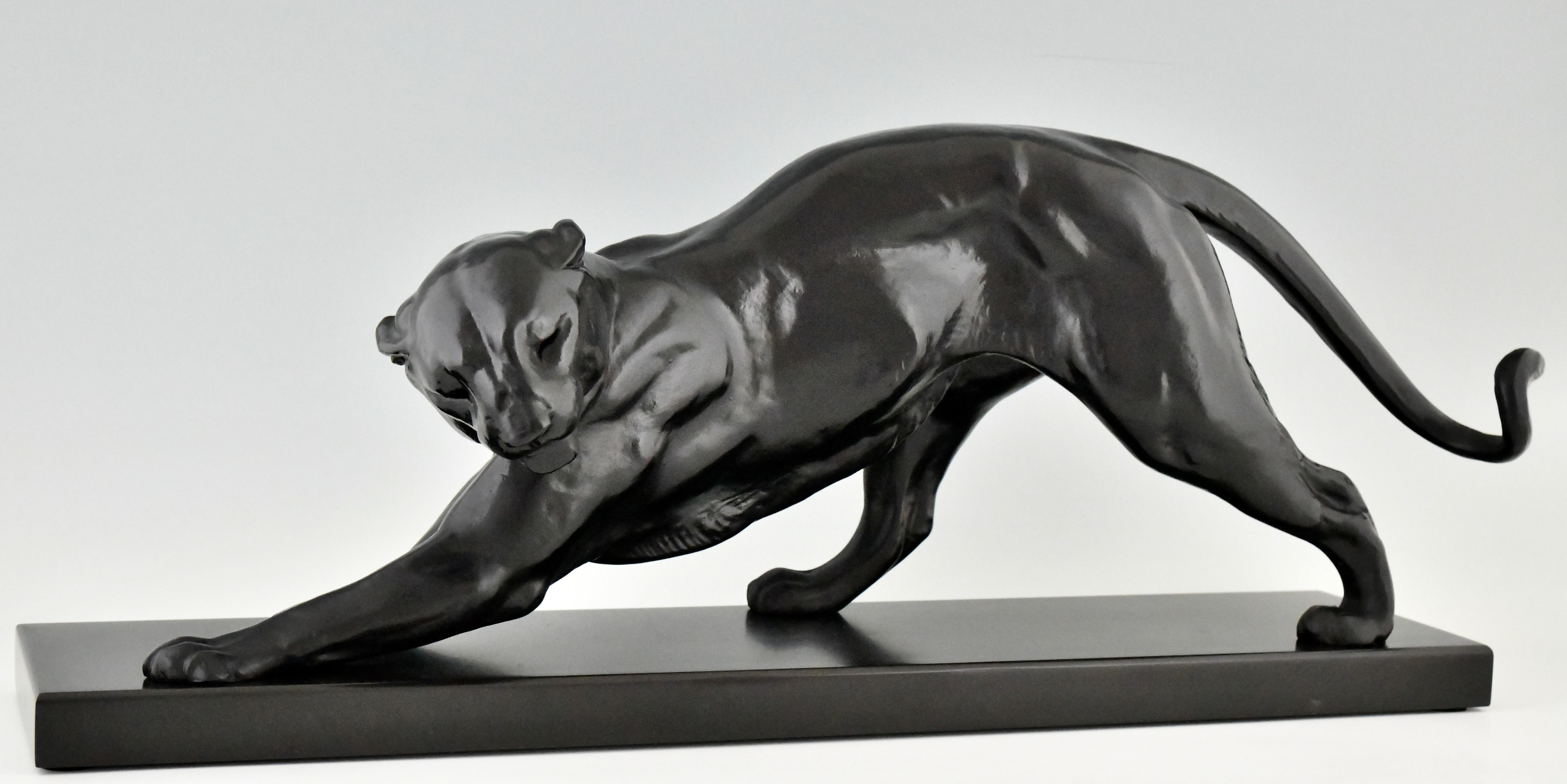 Art Deco sculpture of a black panther by the French artist Plagnet. The Art metal sculpture has a lovely back patina and stands on a Belgian Black marble base, France, circa 1930.