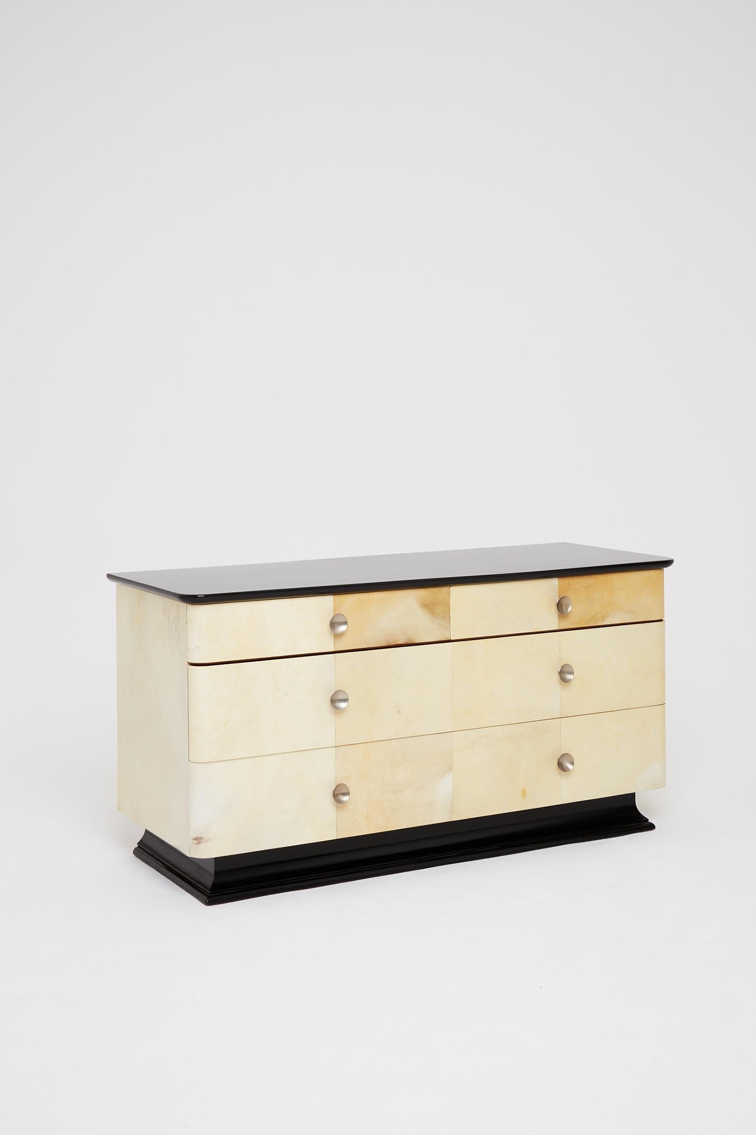 French Art Deco Parchment and Ebonized Double Chest of Drawers