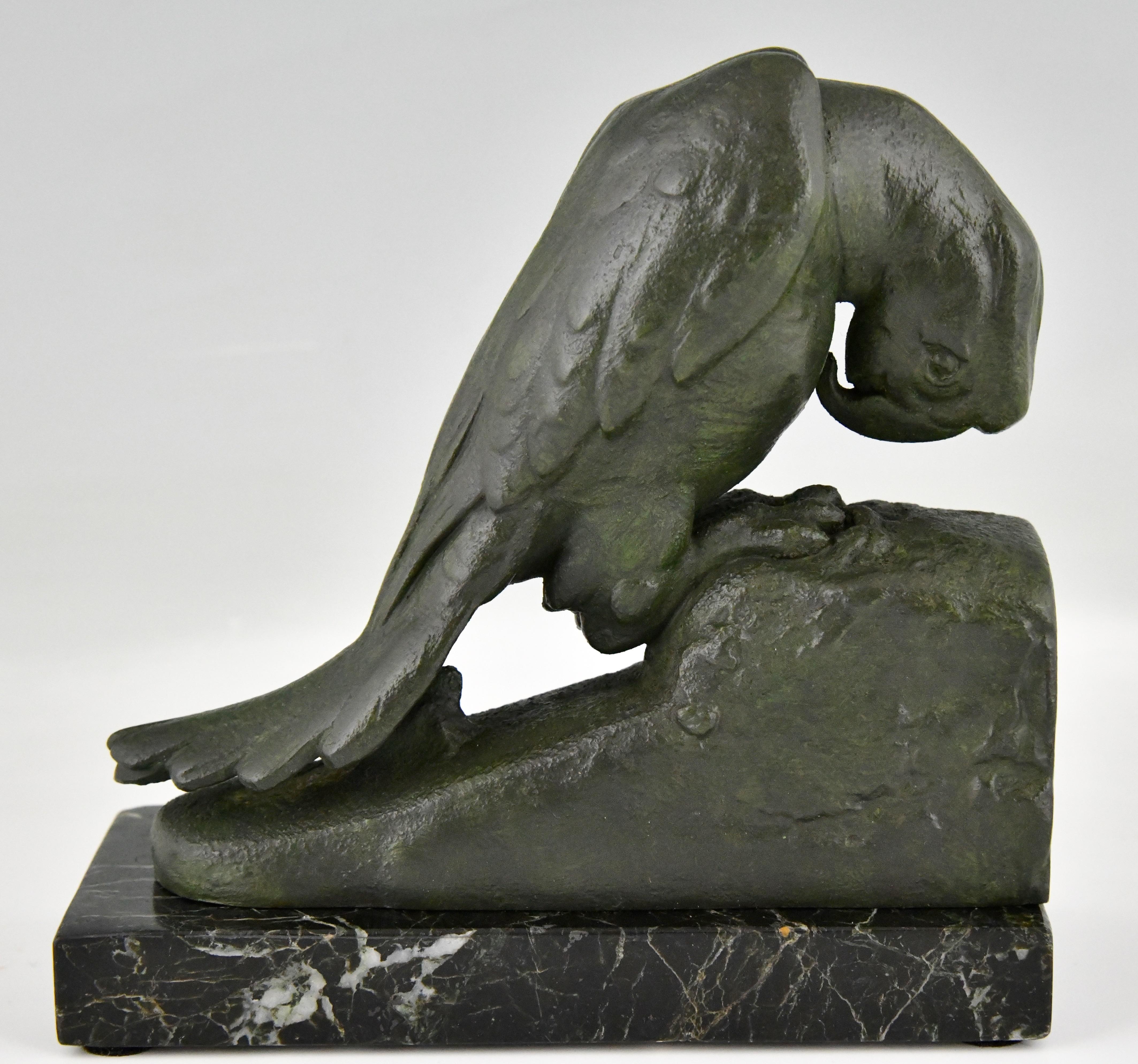 Mid-20th Century Art Deco Parrot Bookends by Georges Van De Voorde with Foundry Seal Brig, Paris For Sale