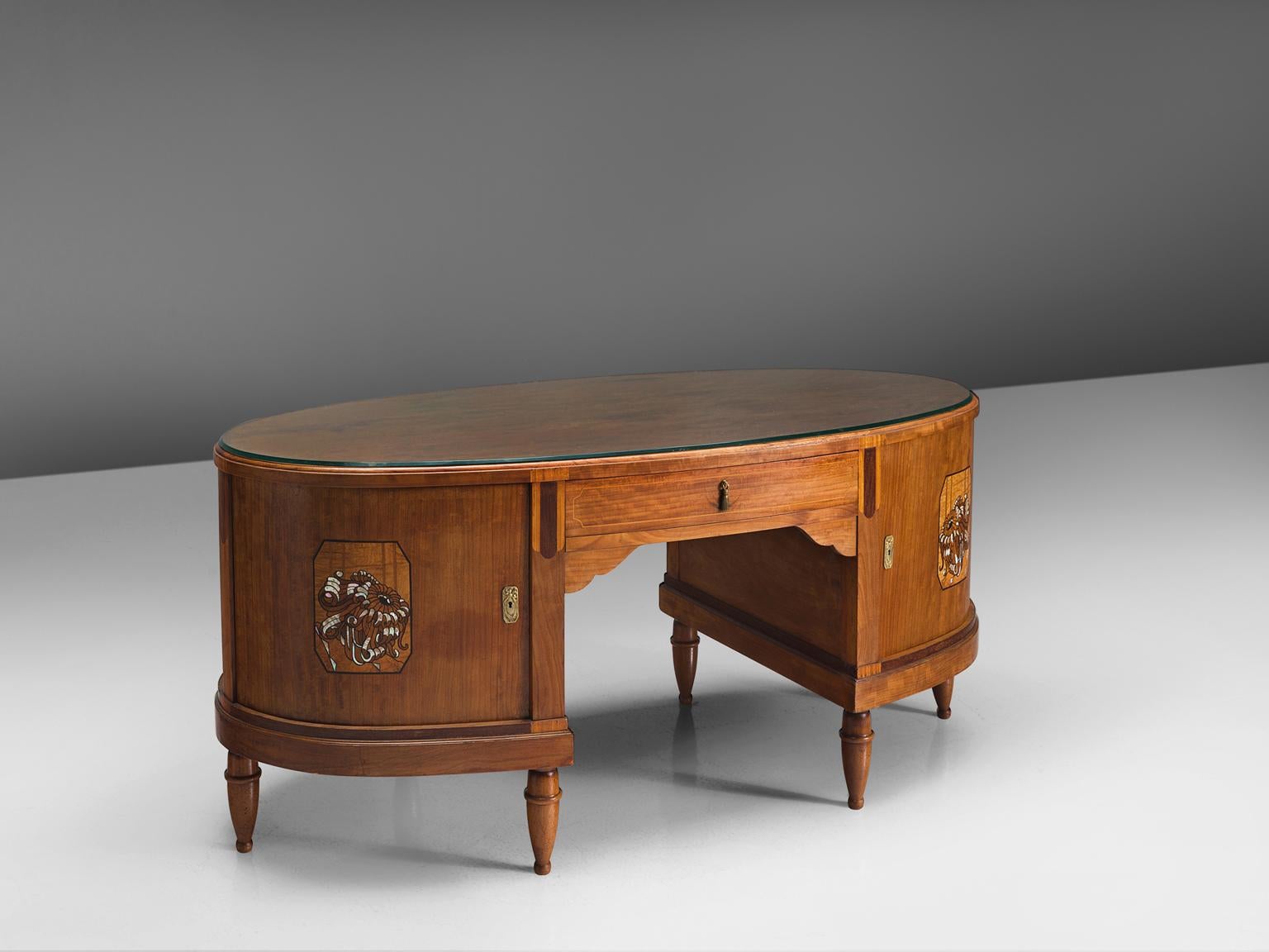 Desk, in mahogany, mother-of-pearl and brass, France, 1930s. 

This mahogany Art Deco executive desk has a front and back that are identical, both equipped with a drawer and two curved doors. Each door has a beautifully made veneer and