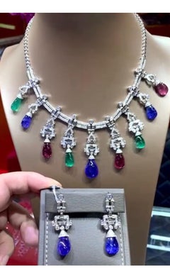 AIG Certified 123.00 Ct Emeralds Tanzanites Tourmalines Diamonds 18K gold Parure