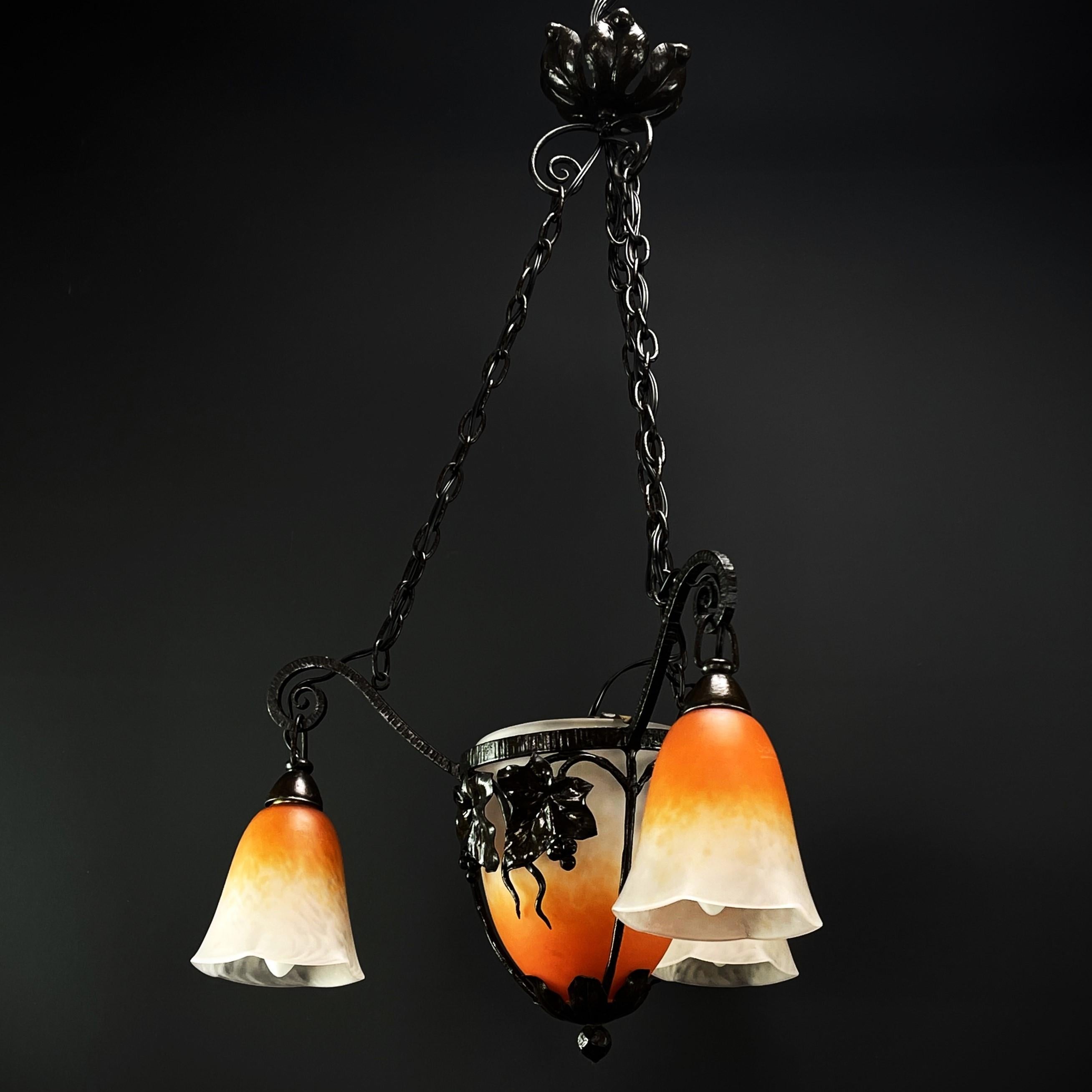 Art Deco chandelier by Schneider - 1930s

The ART DECO ceiling lamp is a remarkable example of early 20th century craftsmanship and style. 

The signature 