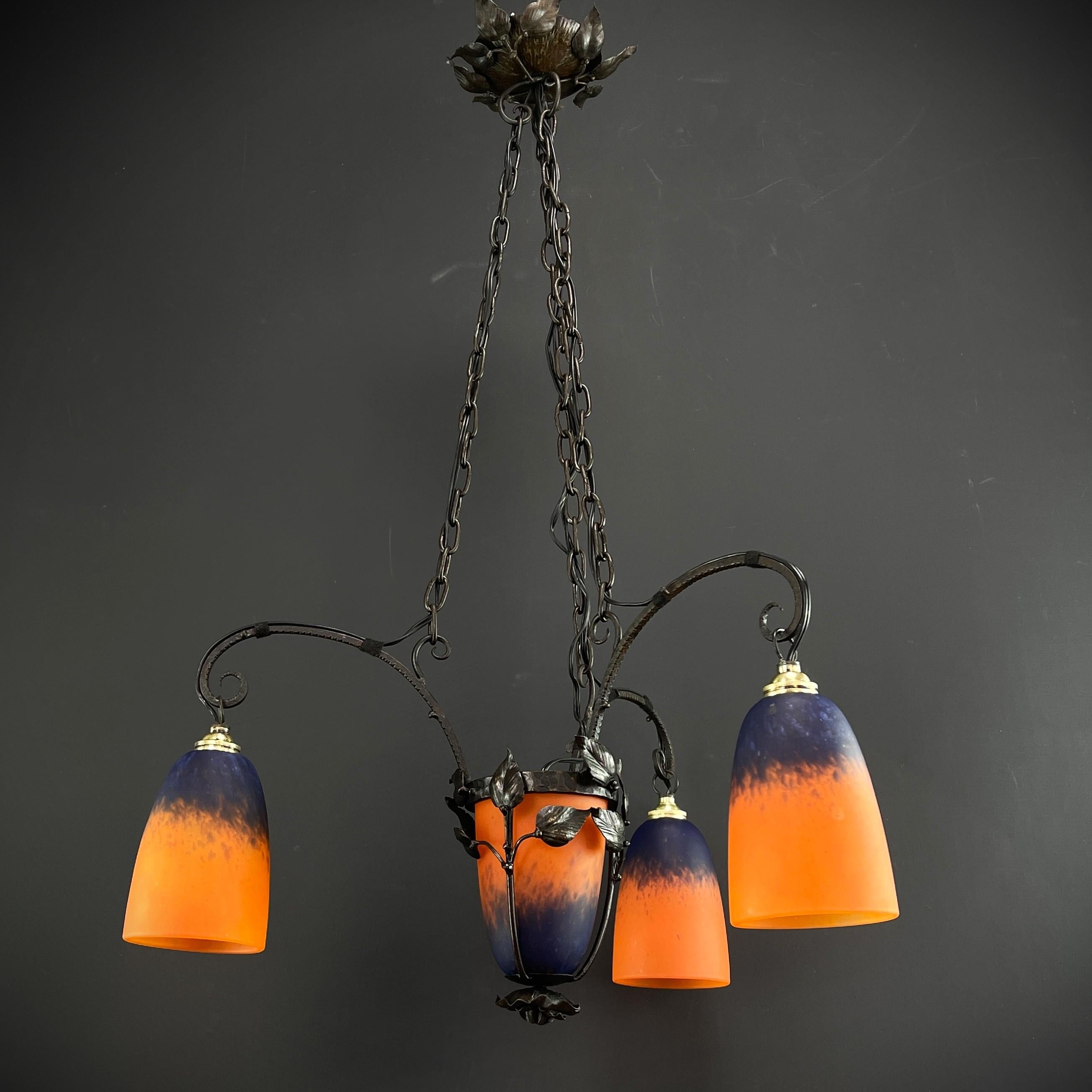 Art Deco chandelier by Schneider - 1930s

The ART DECO ceiling lamp is a remarkable example of early 20th century craftsmanship and style. 

The signature 
