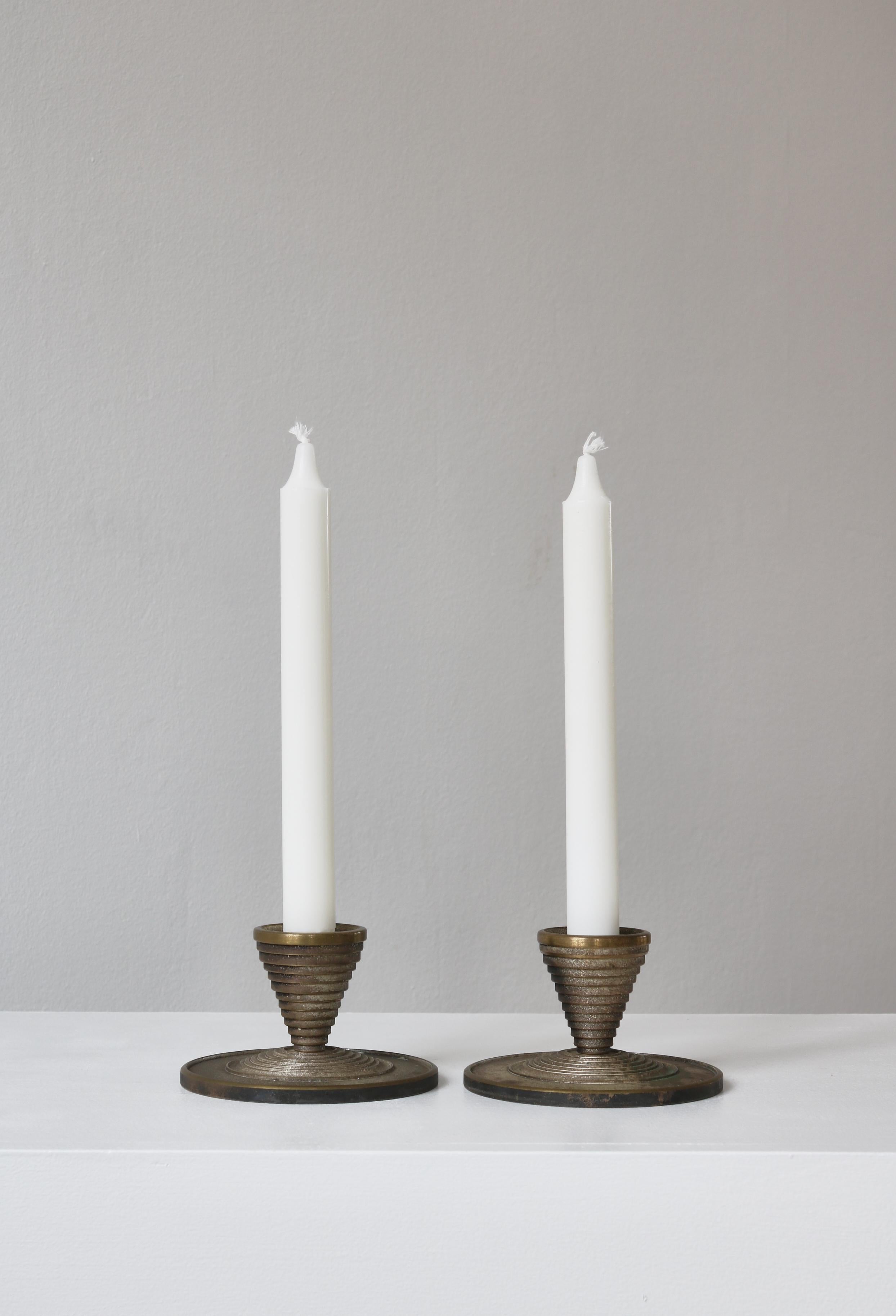 Amazing pair of Danish Art Deco candlesticks in beautifully patinated bronze. Made in the 1940s. Marked 