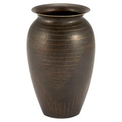 Vase Dinanderie patiné Art Déco de Jean Dunand