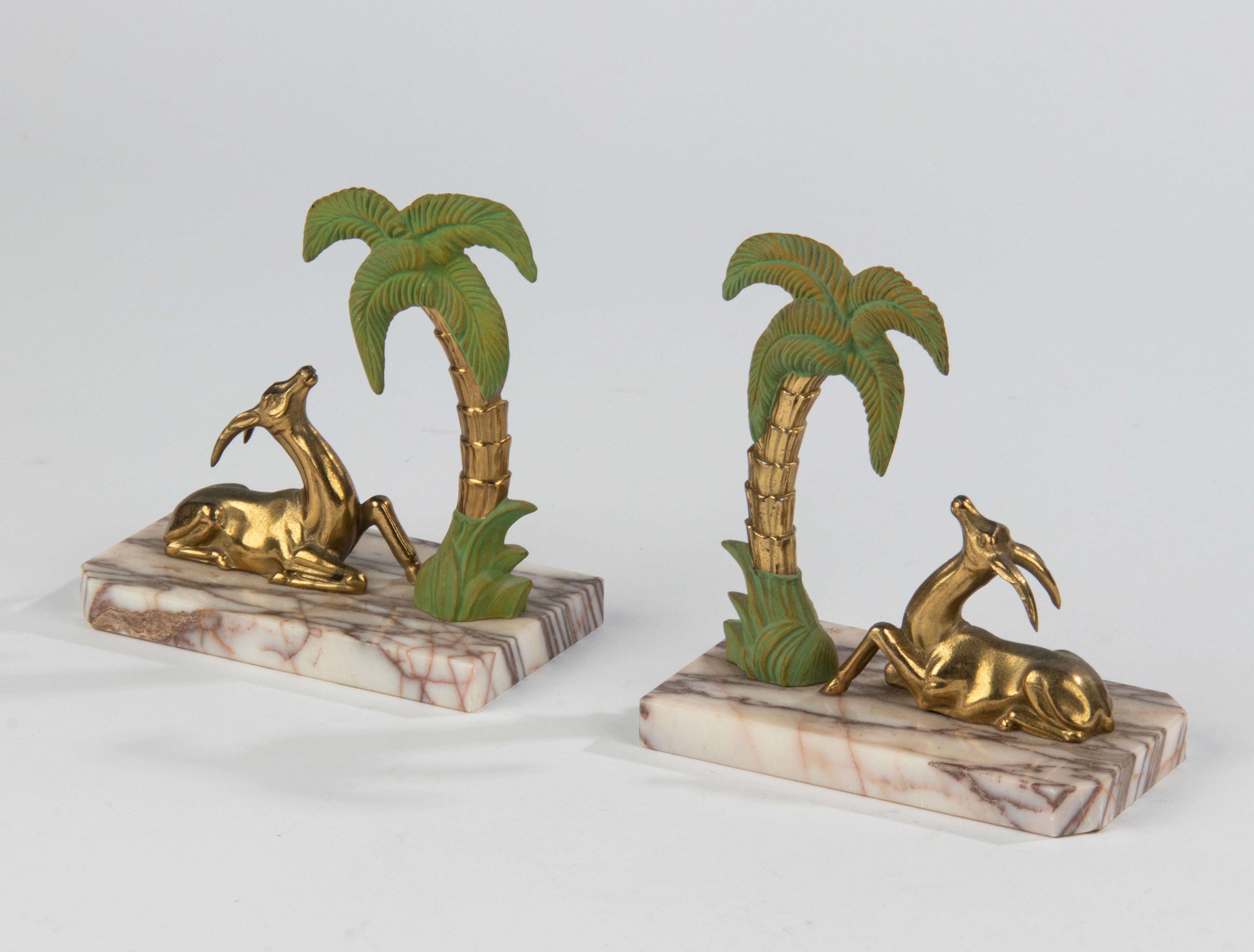 French Art Deco Patinated Spelter and Marble Bookends with Gazelle Deer and Palmtree For Sale