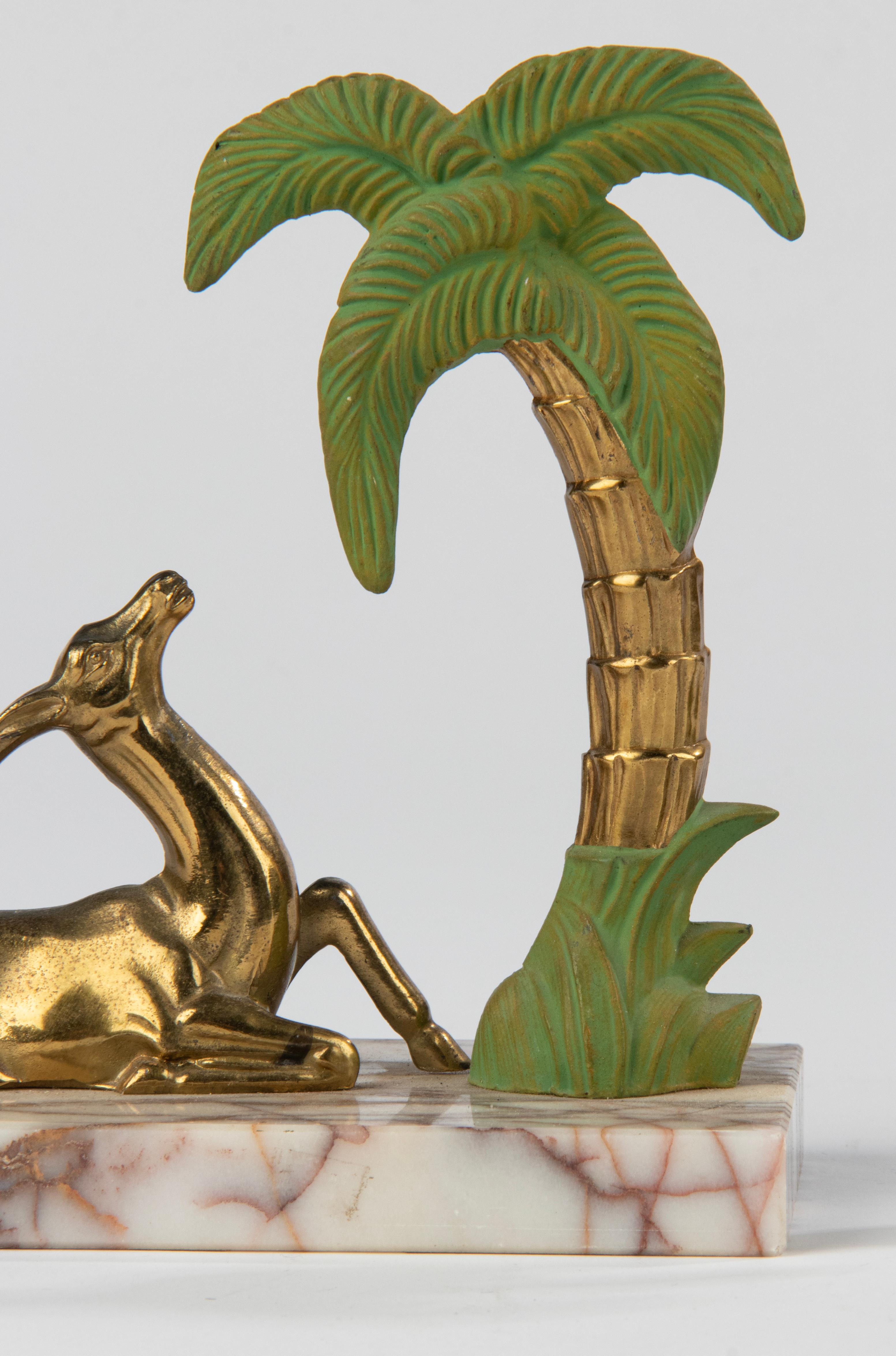 Art Deco Patinated Spelter and Marble Bookends with Gazelle Deer and Palmtree In Good Condition For Sale In Casteren, Noord-Brabant