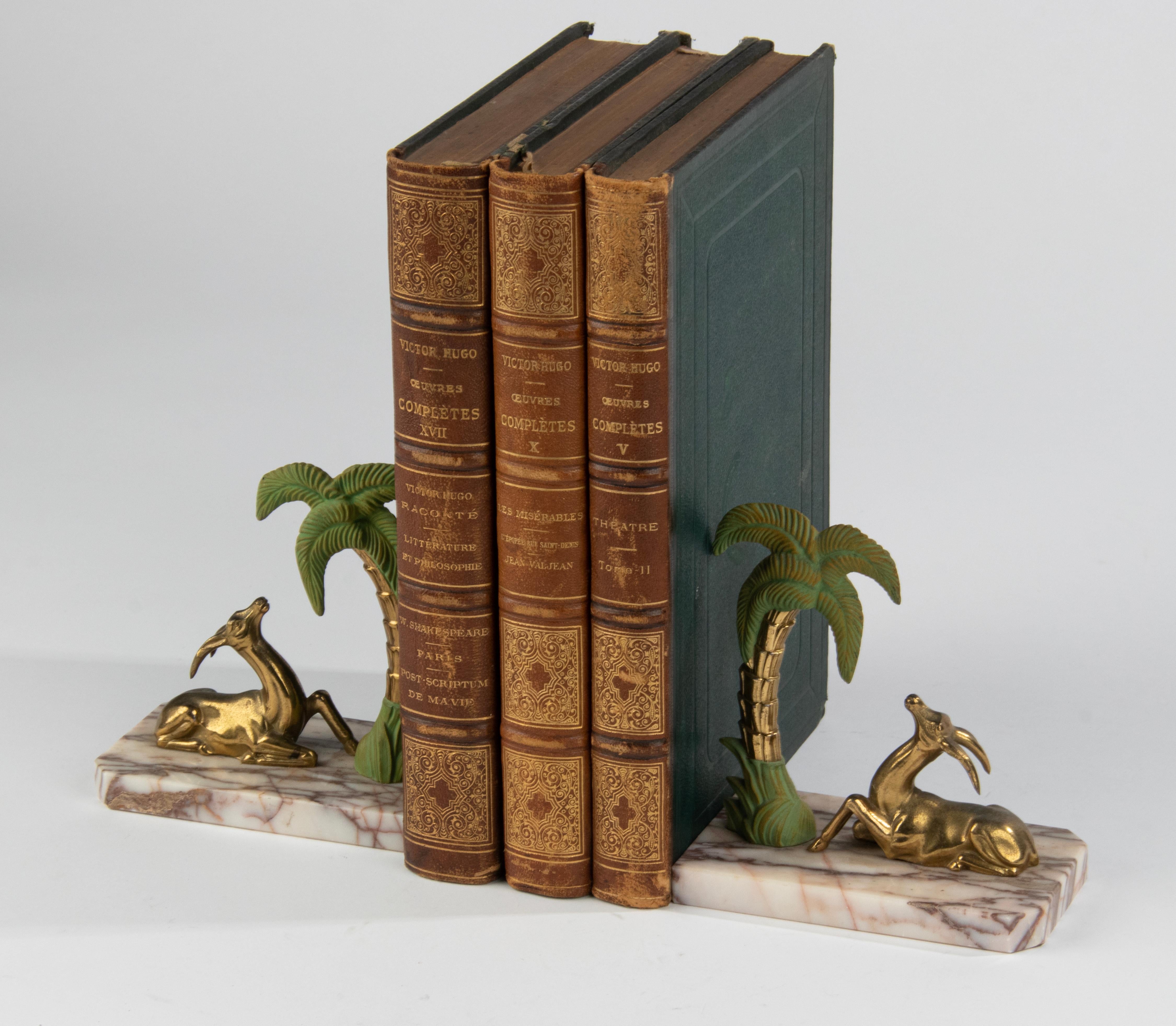 Early 20th Century Art Deco Patinated Spelter and Marble Bookends with Gazelle Deer and Palmtree For Sale
