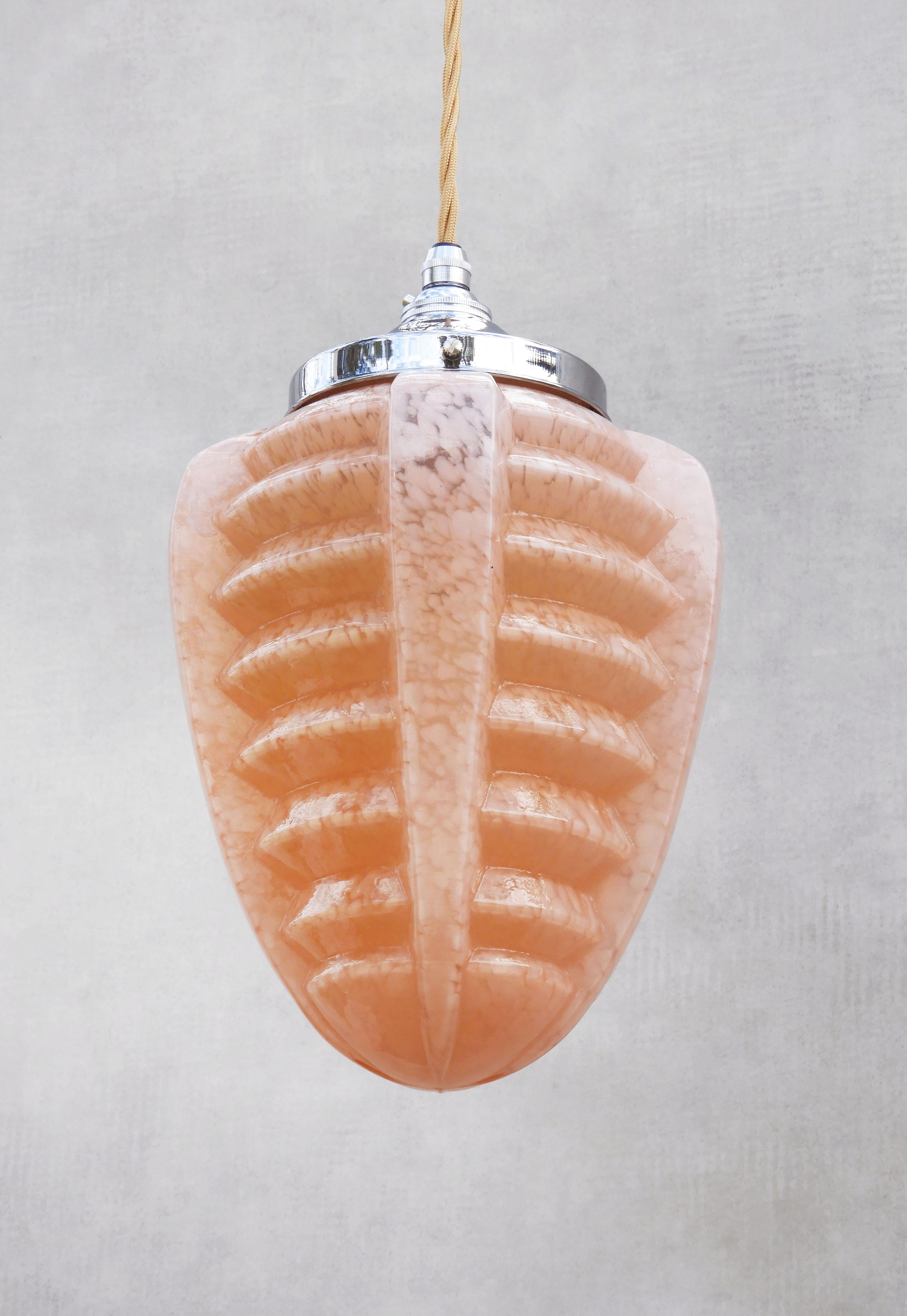French Art Deco 'Machine Age' Clichy Glass Pendant Light C1930.
Glossy stepped peach pink mottled glass shade with new chromed gallery mount. 
In good condition with no losses to glass. Professionally rewired with all new electrical components,