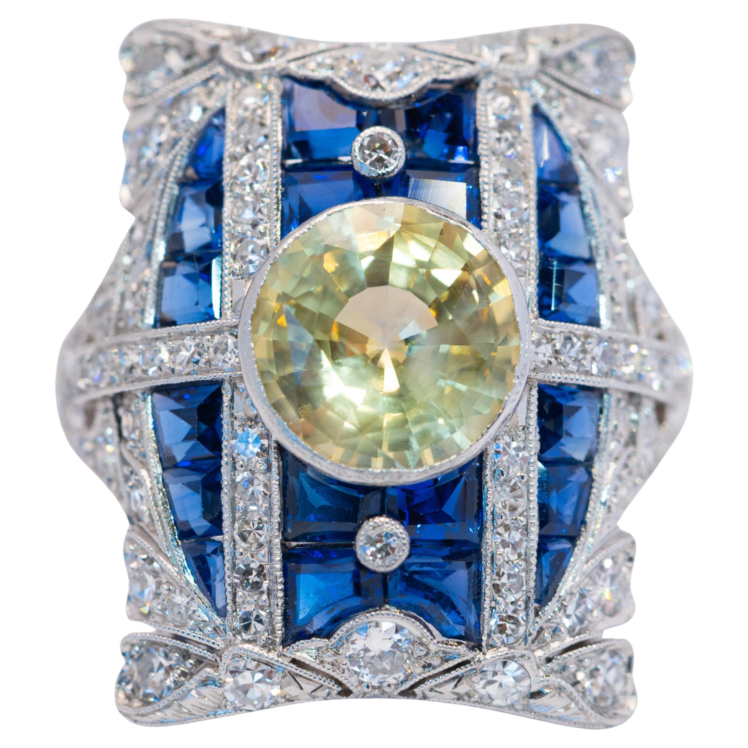 Art Deco Peacock Vintage Ring with Yellow Sapphire, Blue Sapphires & Diamonds For Sale