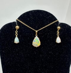 Art Deco Pear Shape Opal Pendant and Earrings 18 Karat Gold Blue Green Yellow