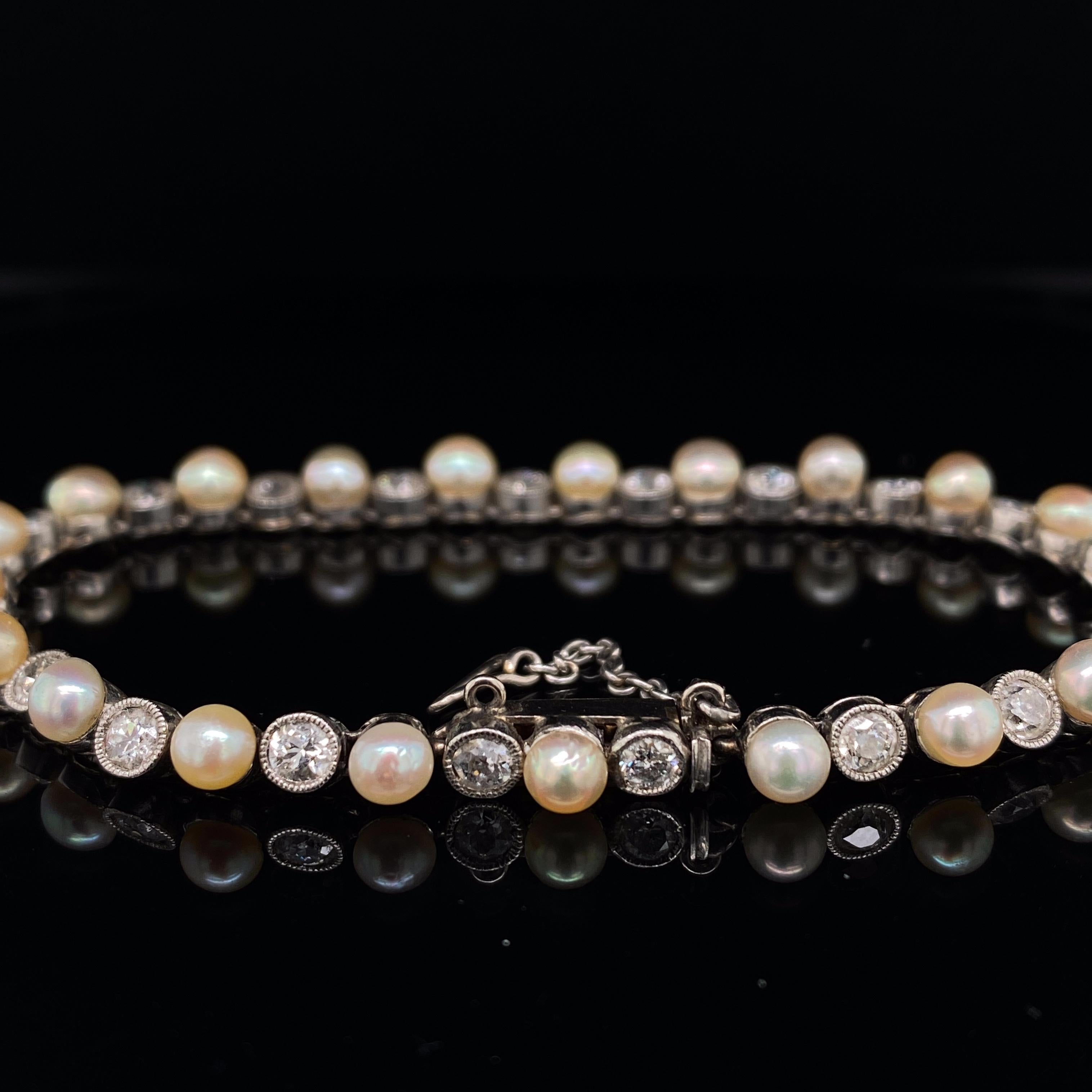 Art Deco pearl and diamond platinum bracelet, circa 1925.

An absolutely stunning original Art Deco pearl and diamond platinum line bracelet.

Created with the lightness of touch that master craftsmen of this golden jewellery period were hailed