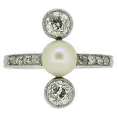 Antique Art Deco Pearl and Diamond Three-Stone Ring