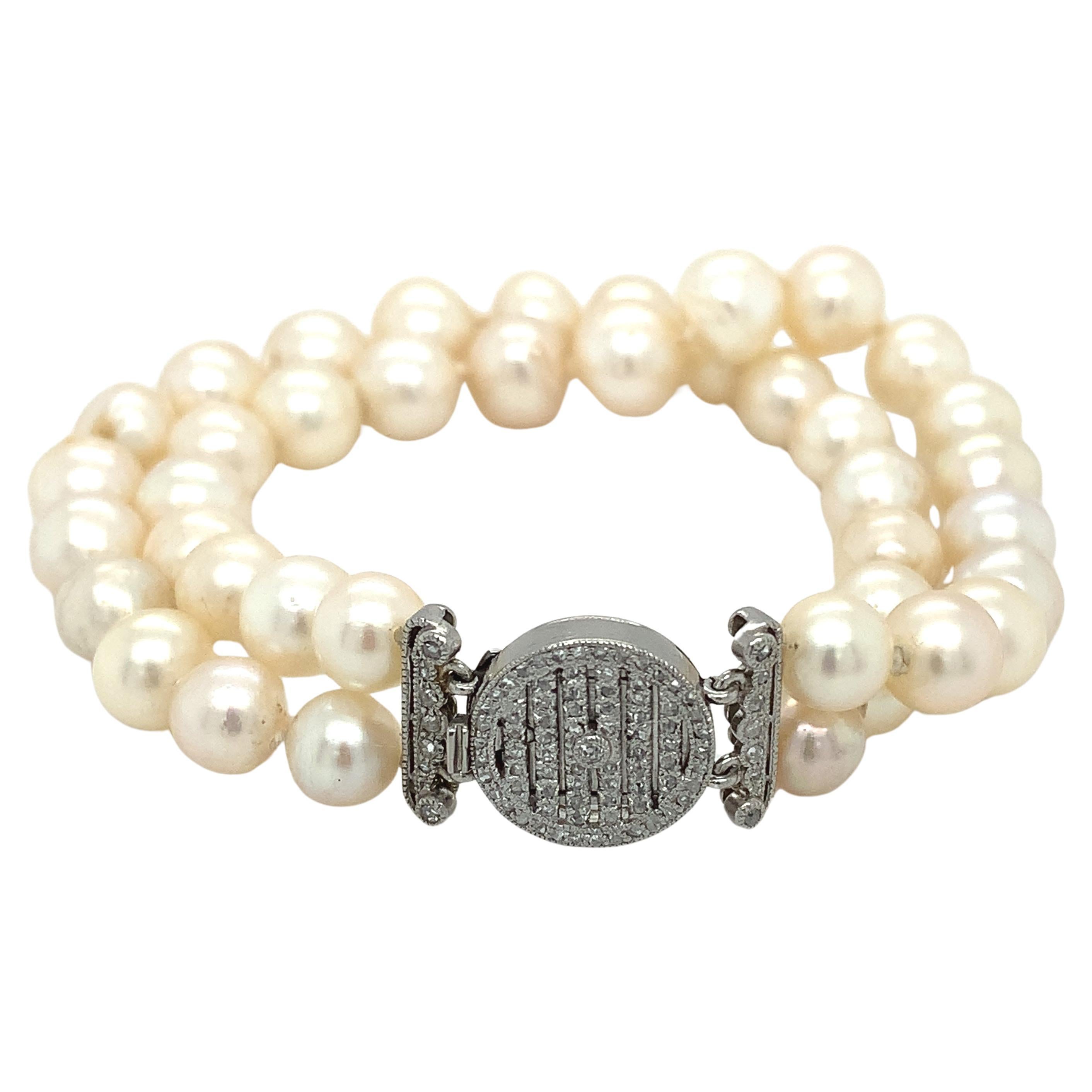 Bracelet double brin Art déco en platine avec perles et diamants en vente