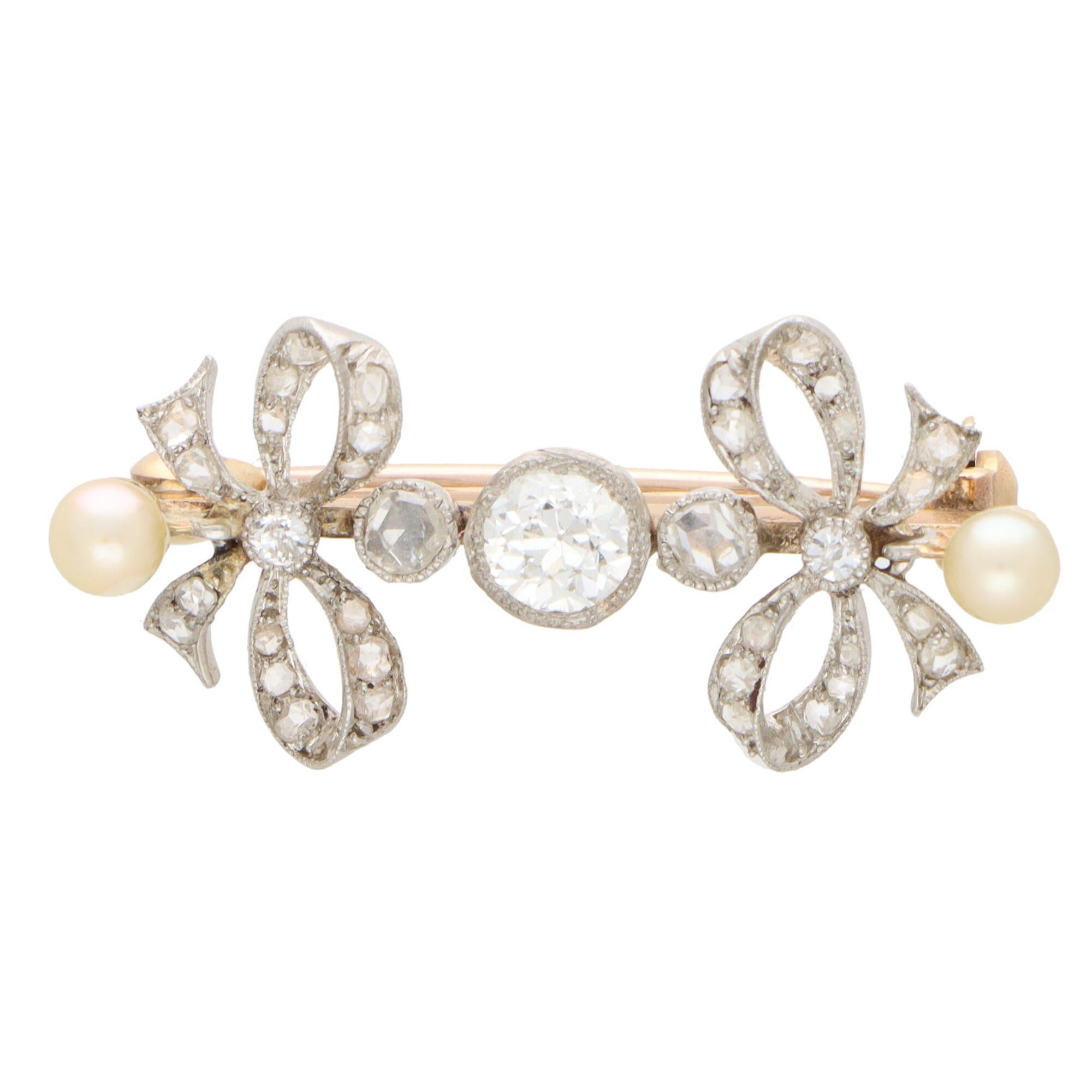 Women's or Men's Art Deco Pearl and Old Cut Diamond Bow Pin Brooch in Platinum and Gold