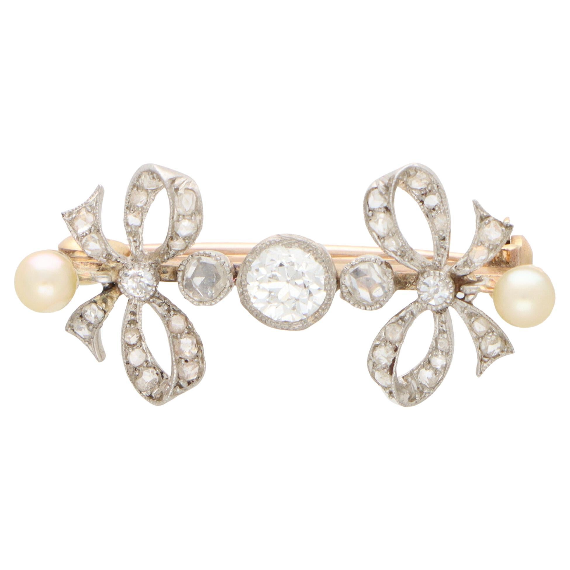 Art Deco Pearl and Old Cut Diamond Bow Pin Brooch in Platinum and Gold