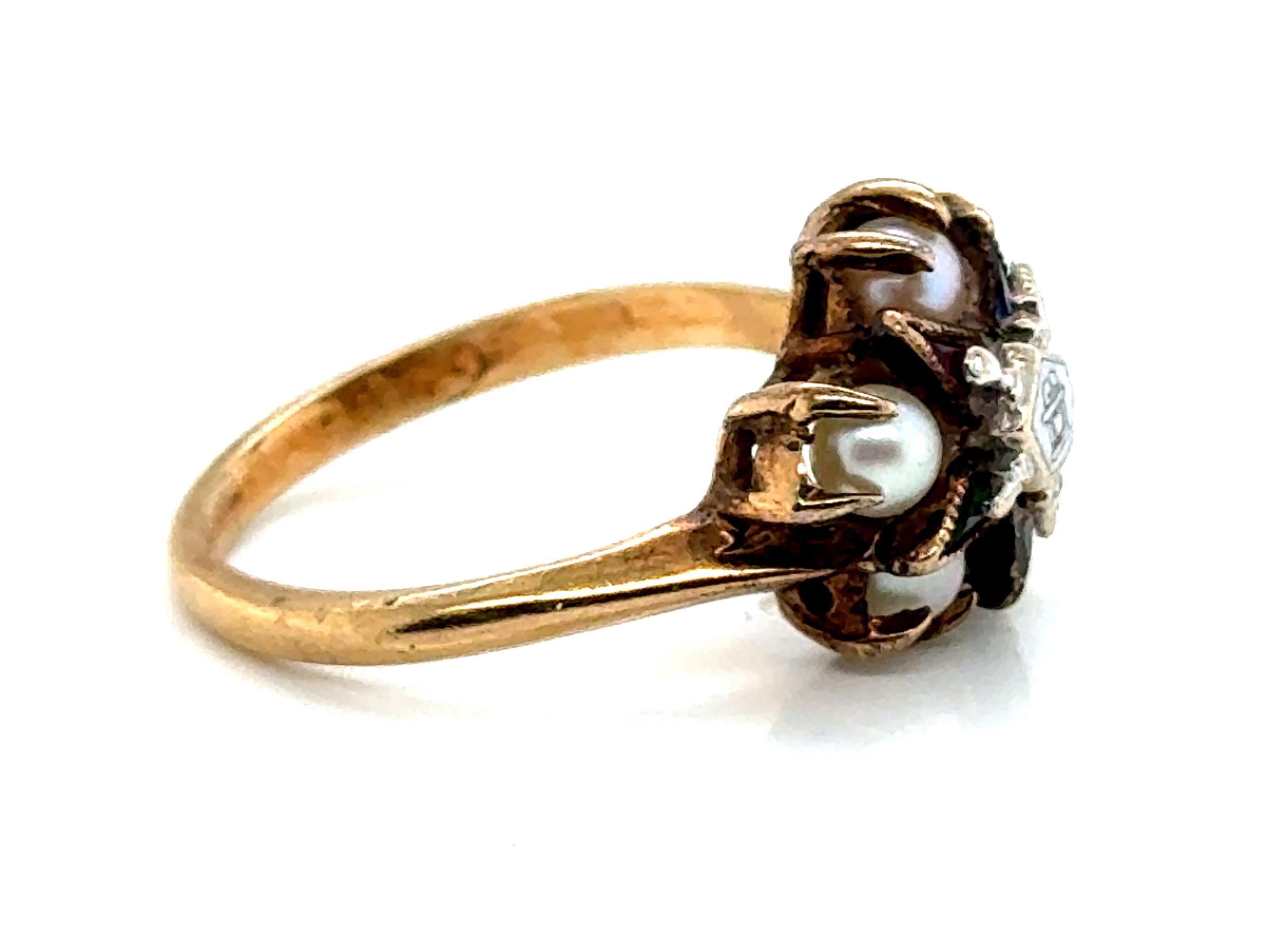 Echte Original-Antike aus den 1930er Jahren Art Deco Perle Eastern Star Ring Cocktail Vintage Gelbgold



Mit fünf wunderschönen echten Naturperlen

Dreieckige Edelsteine im Laborschliff in den Farben Rot, Gelb, Blau, Grün und Weiß

Alles