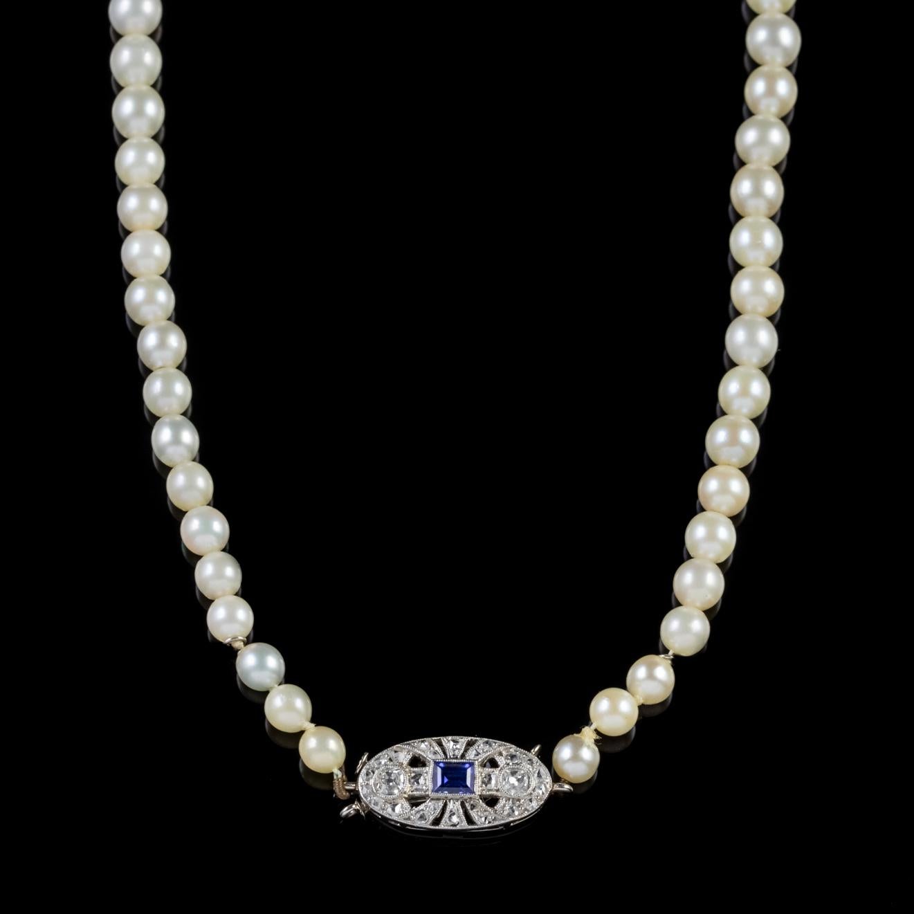An elegant Art Deco cultured Pearl necklace made up the most beautiful, lustrous Pearls which graduate in size to a fabulous box clasp decorated with old cut Diamonds and a lovely French cut Sapphire in the centre which is approx. 0.15ct

Pearls are