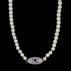 Art Deco Pearl Necklace Sapphire Diamond Platinum Clasp, circa 1930
