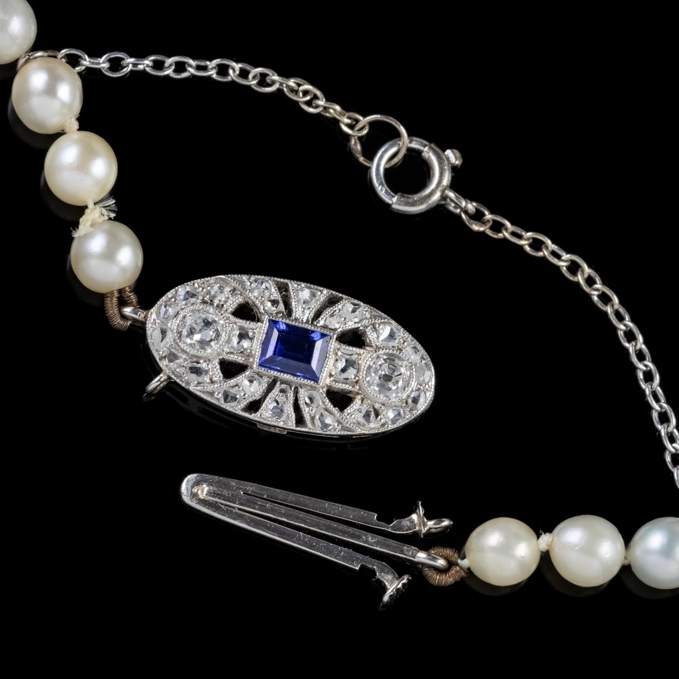 Art Deco Pearl Necklace Sapphire Diamond Platinum Clasp, circa 1930 For Sale 1