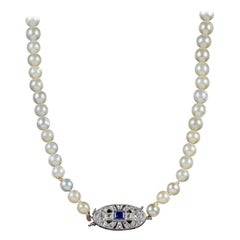 Vintage Art Deco Pearl Necklace Sapphire Diamond Platinum Clasp, circa 1930