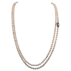 Boucle Art Déco perle simple saphir diamant 18 Kt