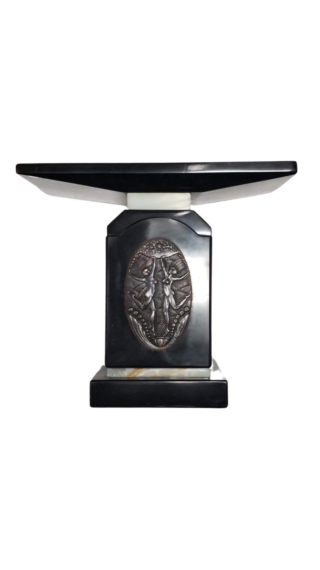 Art Deco tabletop display pedestal in Black Marble with dancer relief and white marble trim in the style of Demetre Chiparus (unsigned)
Demétre Chiparus was a Romanian sculptor who lived from 1886 to 1947. He is best known for his Art Deco