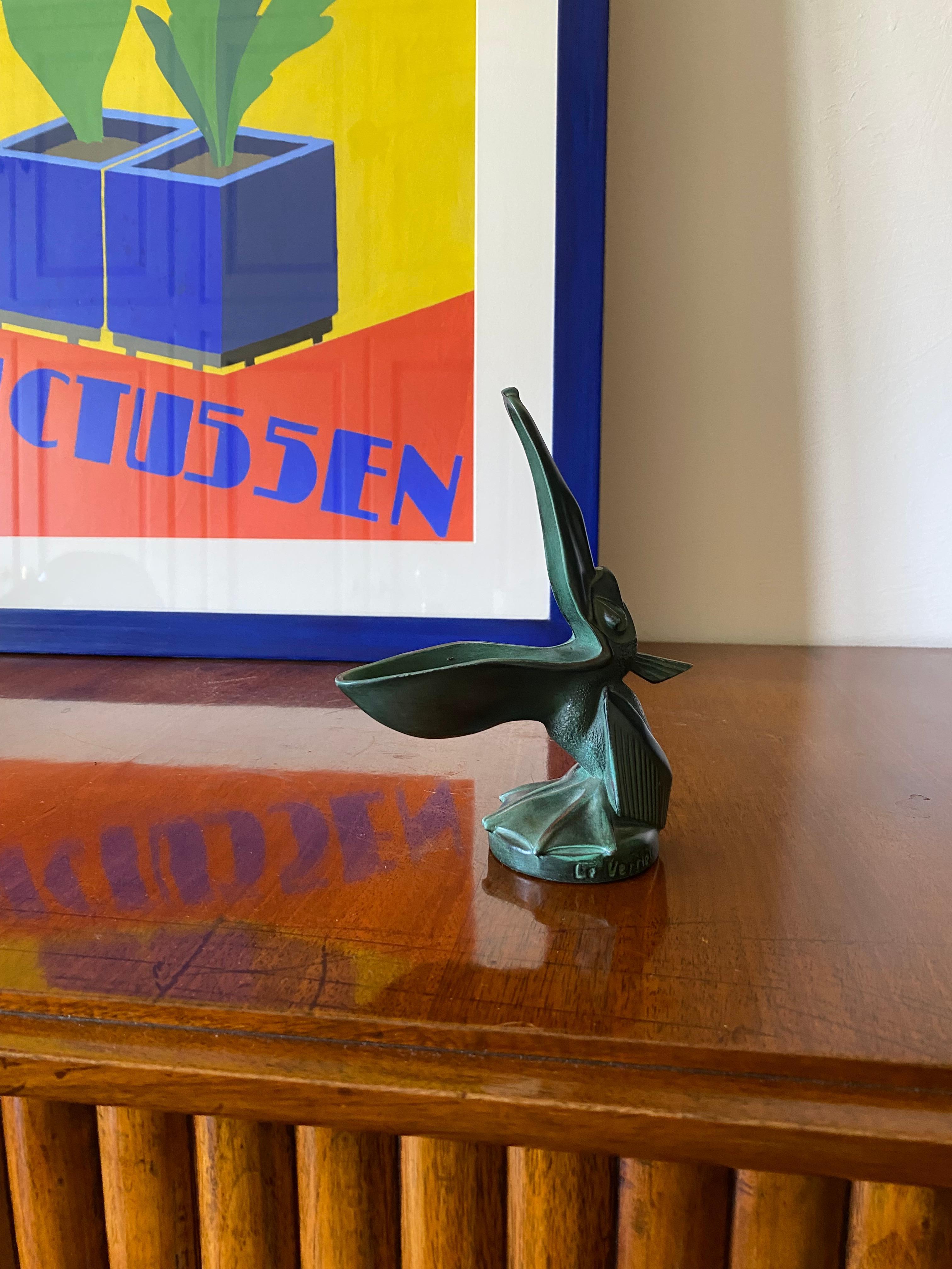 Art Deco pelican bronze ashtray in dark green patina

Max Le Verrier France 1920s

marked on the base

H 18 cm - 14 cm diam. 

Conditions: excellent consistent with age and use. 