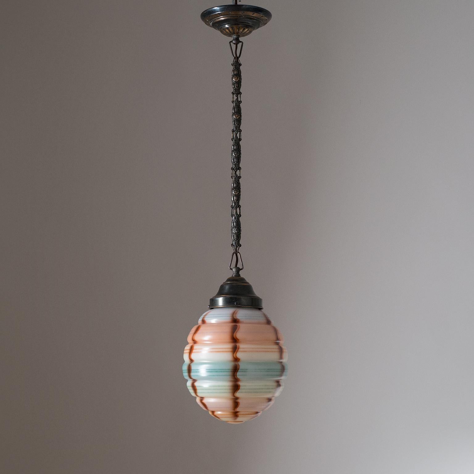 Rare Art Deco pendant or lantern from the 1920s. Very unique enameled glass diffuser with a multi-color aerographed (precurser to air-brush) decor. The intricate detailed hardware is in patinated copper. One original brass and ceramic E27 socket