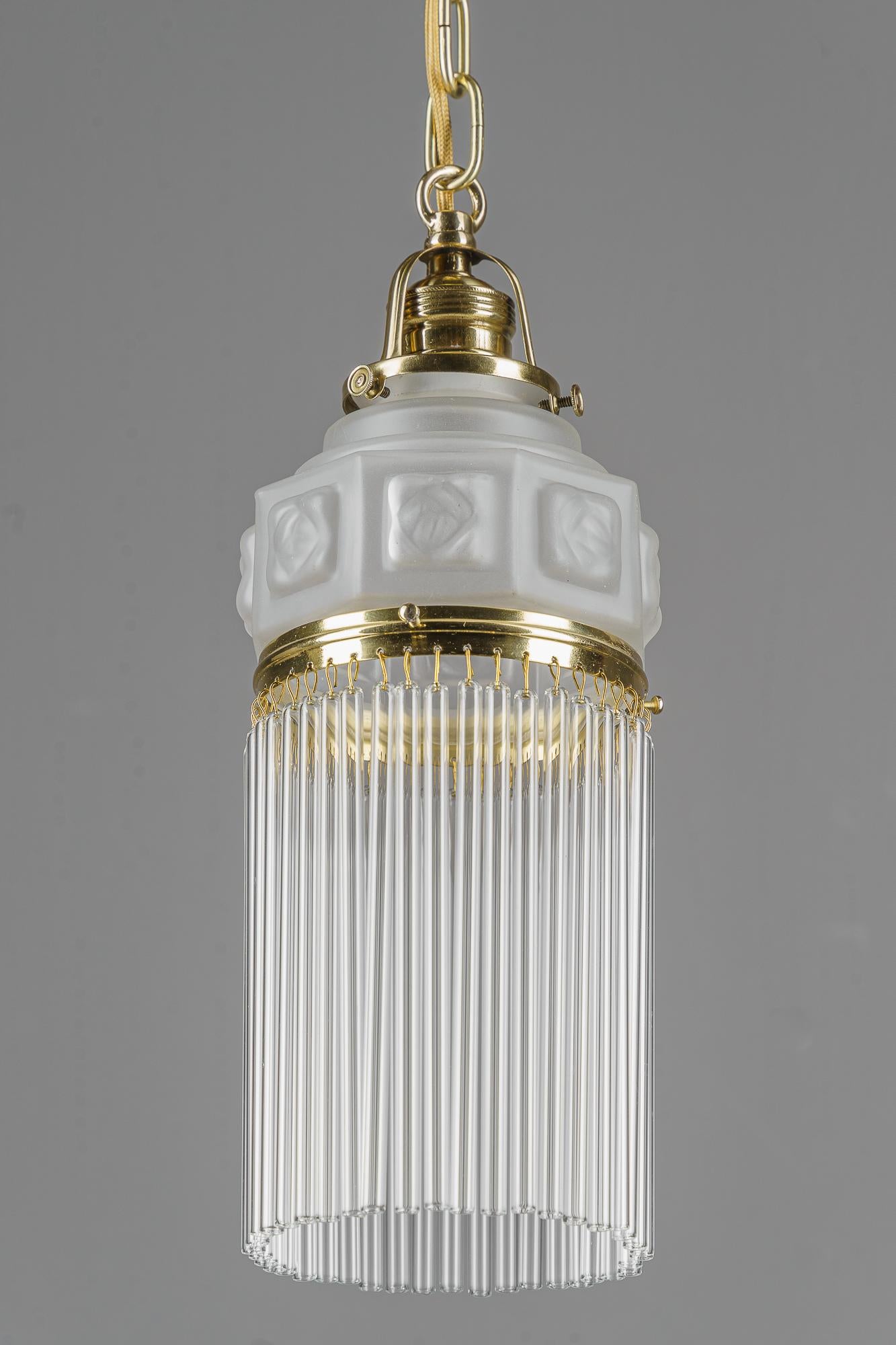 Art Deco pendant around 1920s with frosted glass shade vienna 1920s
Original frosted glass shade
The glass sticks are replaced ( new )
Brass polished and stove enameled