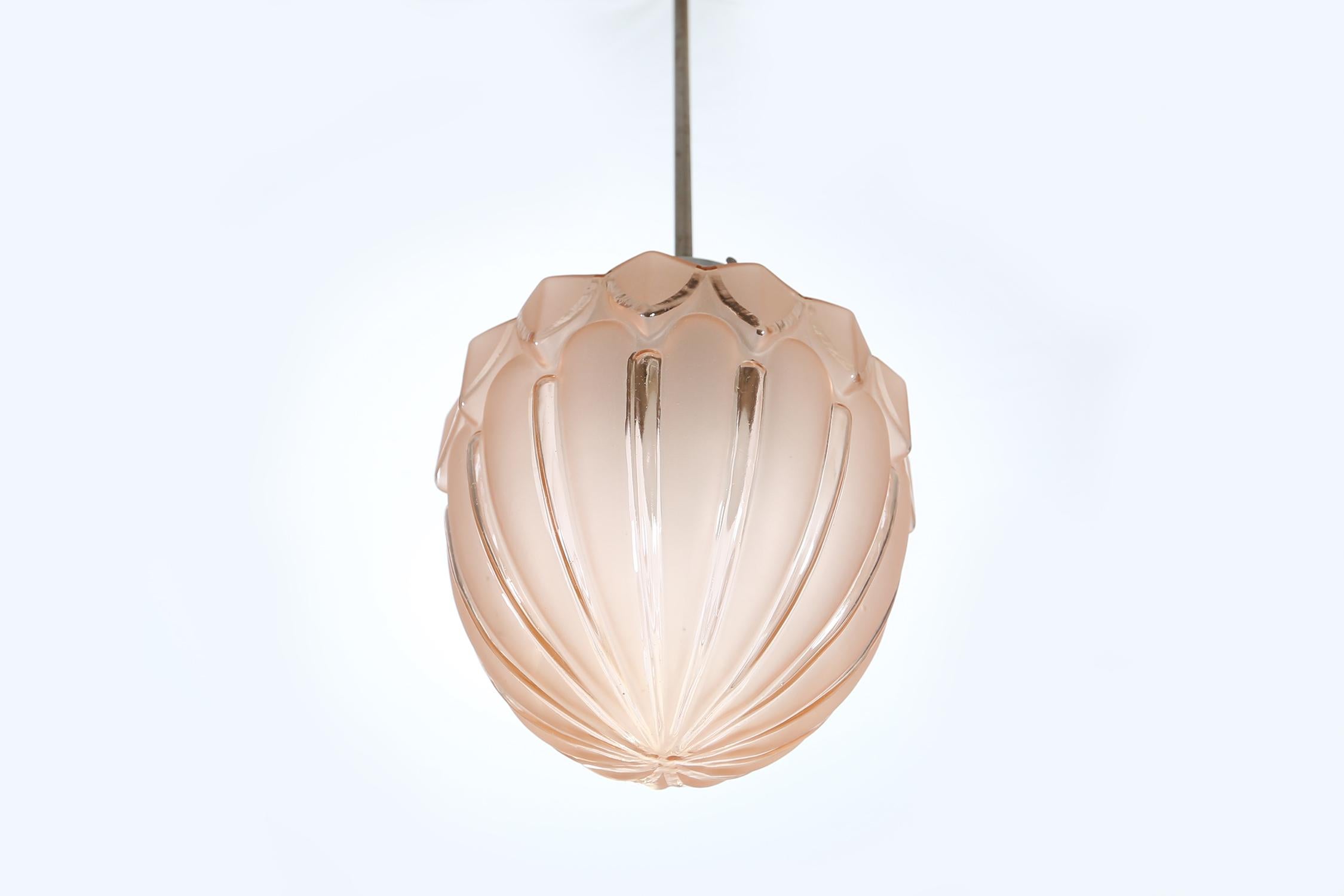 French Art Deco pendant with pink cut glass.
 