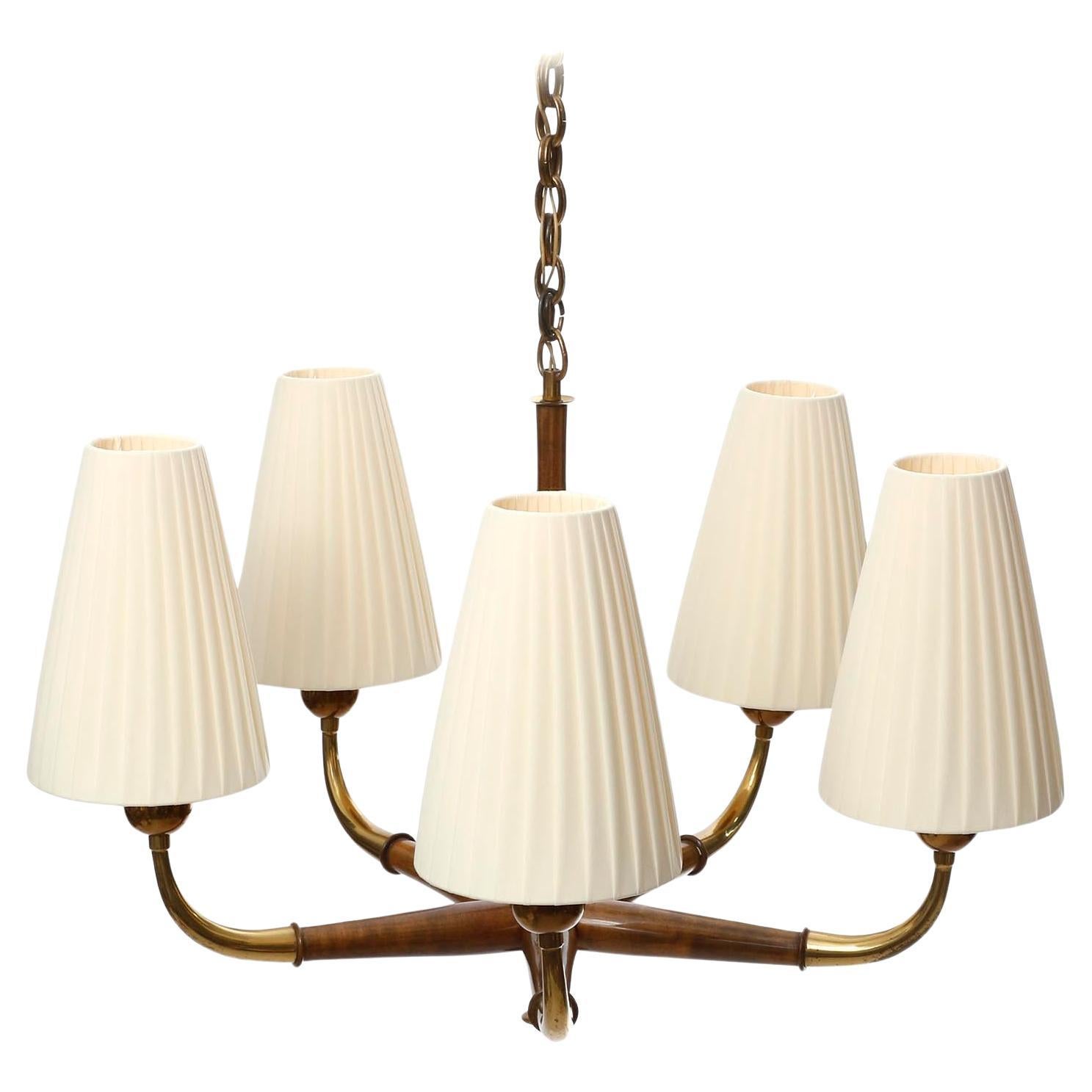 wood and brass chandelier