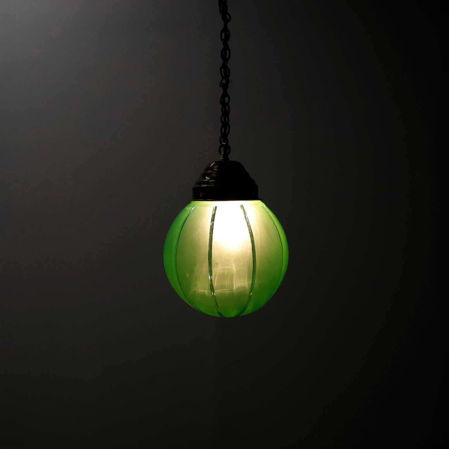 Art Deco Pendant Light in Rare Green Opal Glass and Brass. In Good Condition For Sale In Mexico City, CDMX