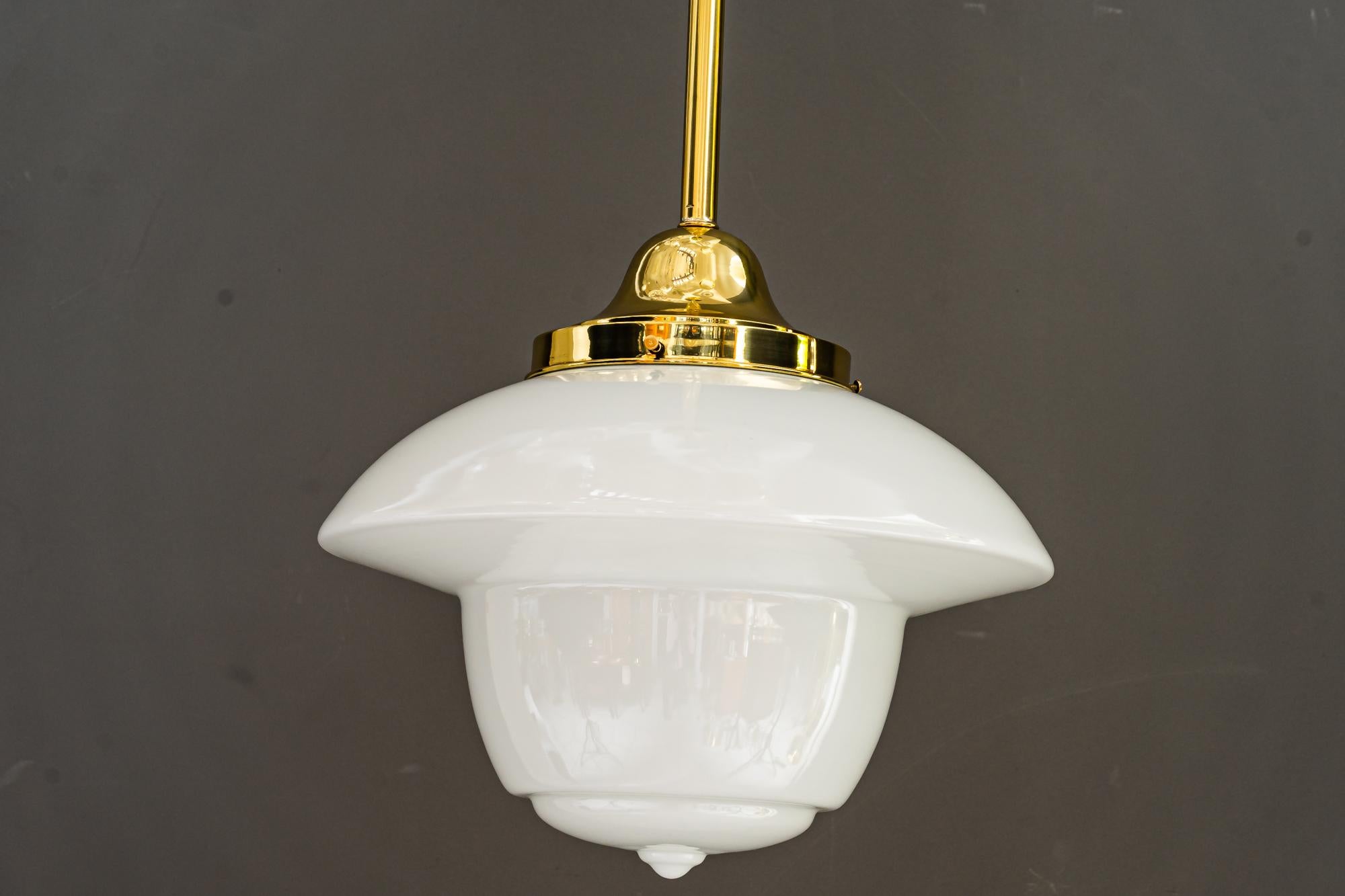 Art Deco pendant Vienna around 1920s
Brass polished and stove enamelled
Original glass shade.