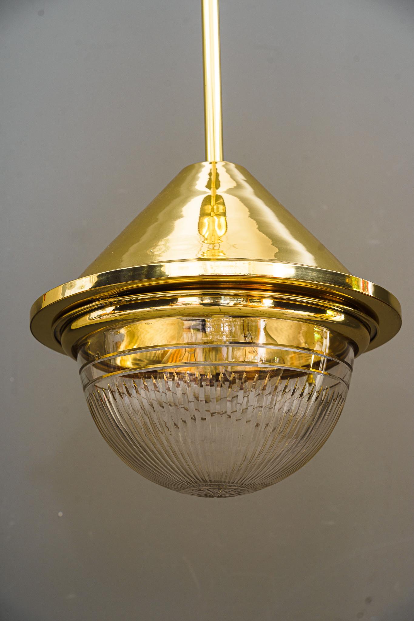 Art Deco pendant vienna with original cut glass shade, circa 1920
Brass polished and stove enameled
Original glass shade
The glass part can be openen for bulb changes.
