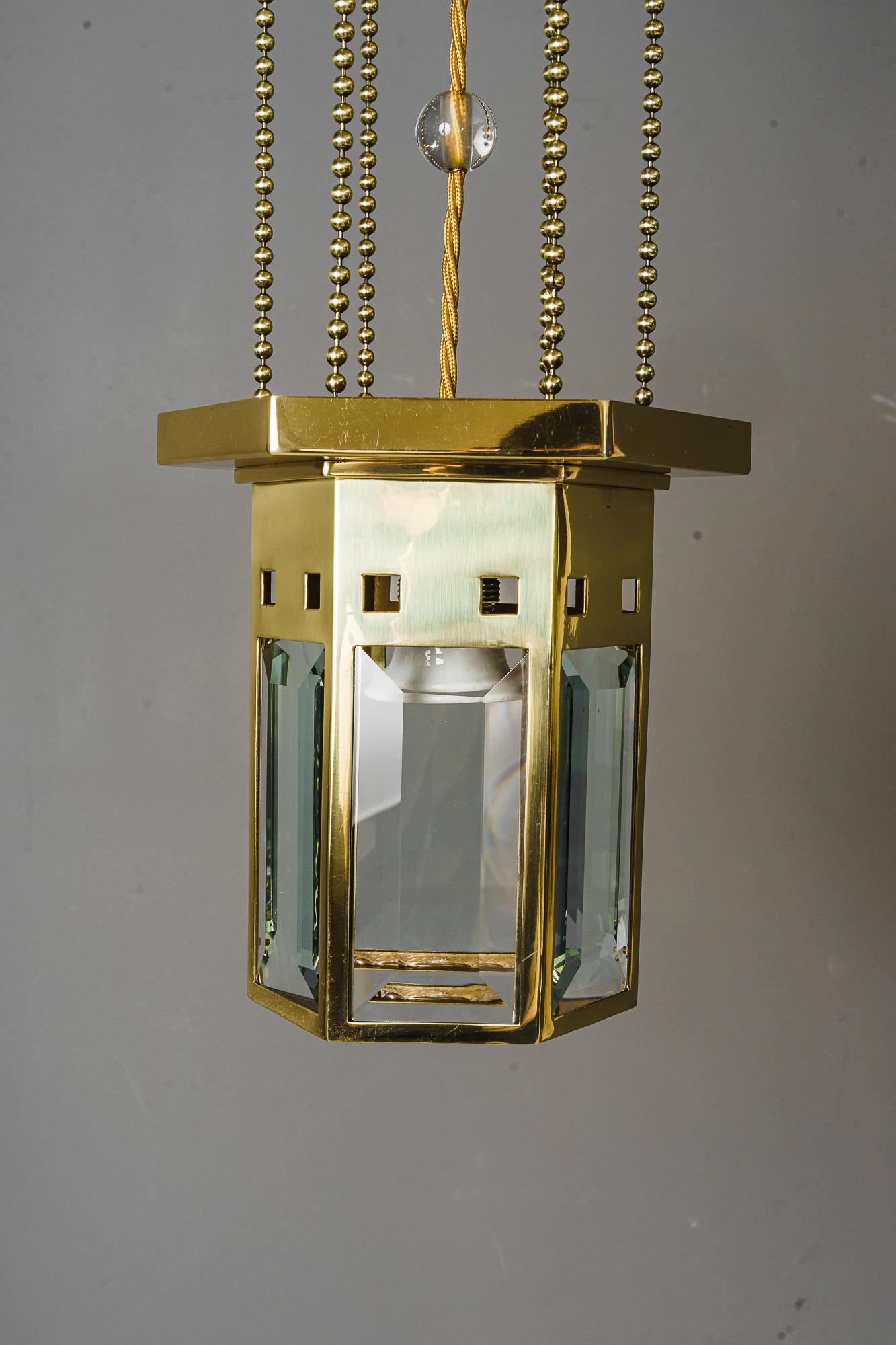 Art Deco pendant, Vienna, around 1920s.
Original glass inside (facet cut)
Polished and stove enameled.