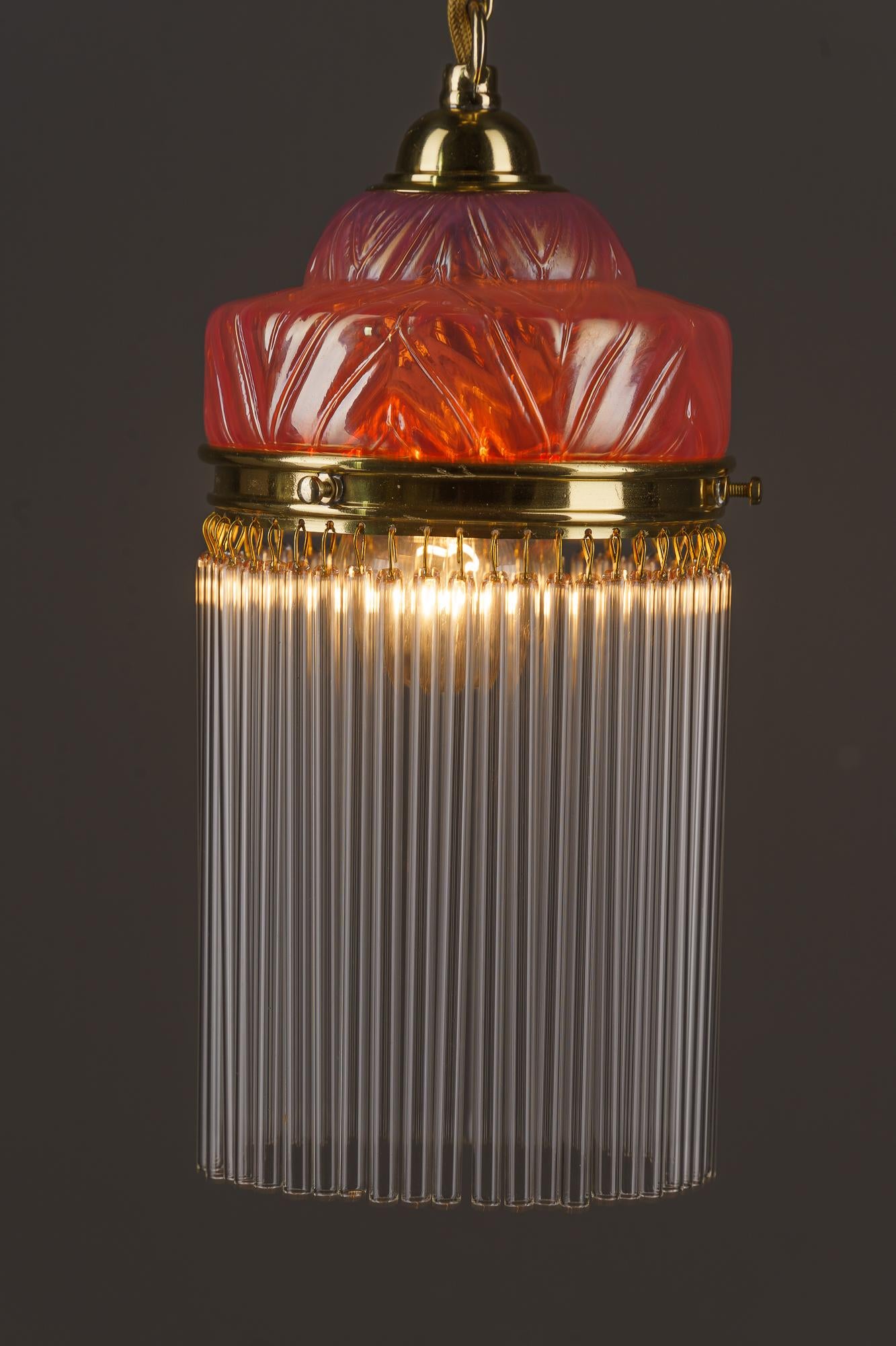 Brass Art Deco pendant with opaline glass shade and glass sticks vienna around 1920s For Sale