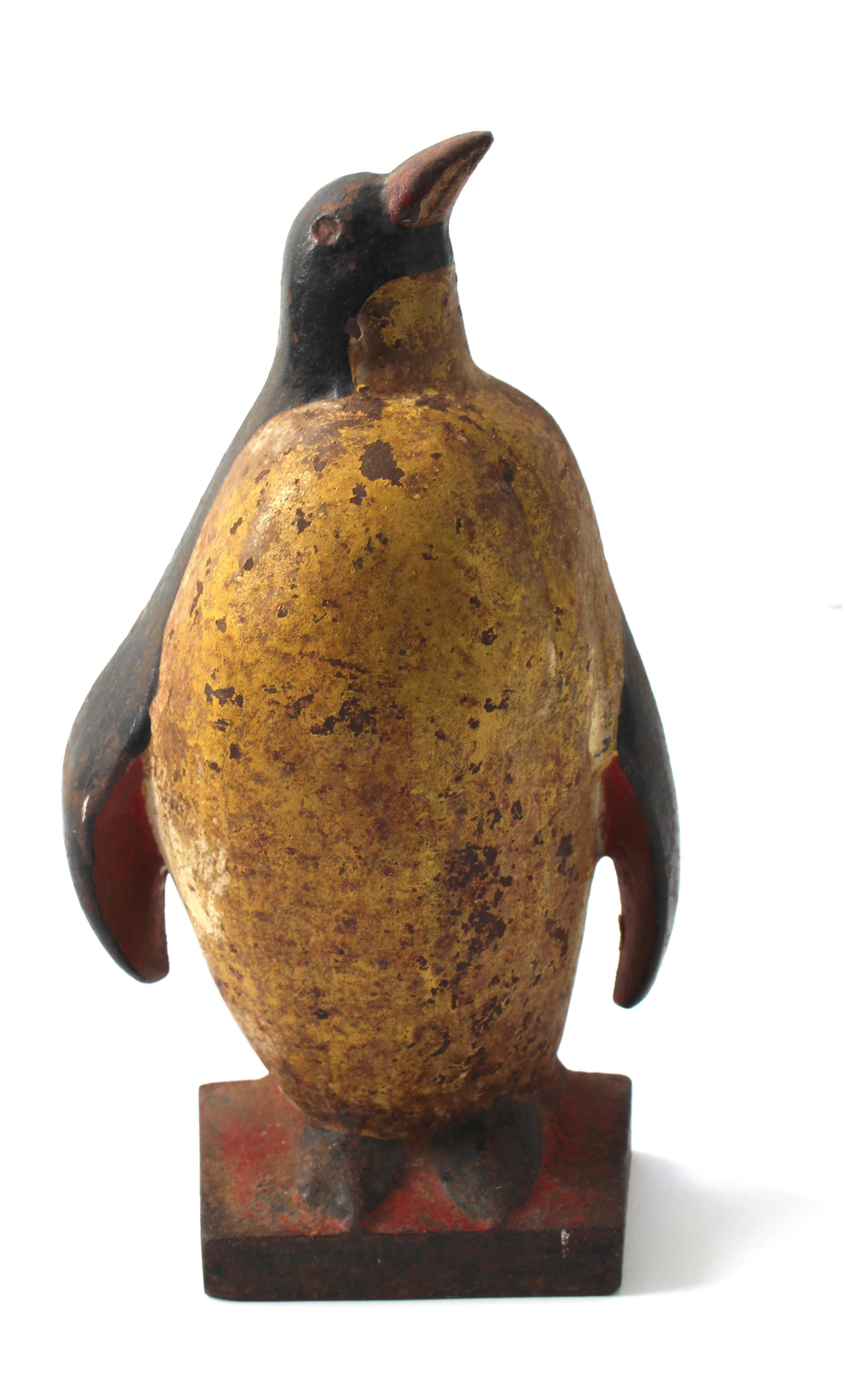 This stylish Art Deco era door stopper is by Taylor Cook and it dates to the 1930s.

The piece retains its origianl cold painted colors.

Note: See verso photo for makers mark.
