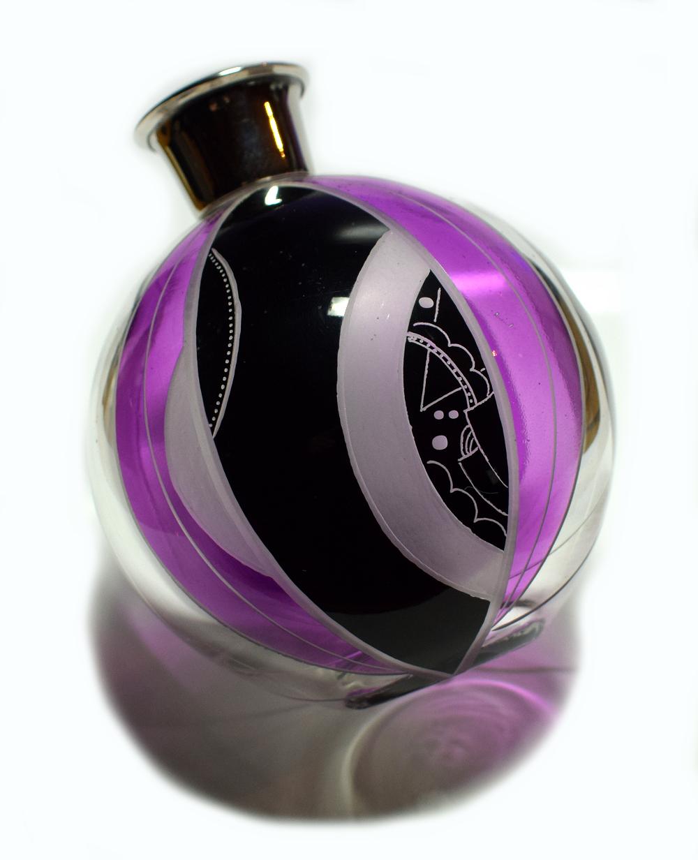 Such a rare find is this large globe shaped Art Deco perfume bottle by Karl Palda. Absolutely exquisite, every angle and side has a different design. I really can't sing the praises of this enough, if you want something beautiful in your life then