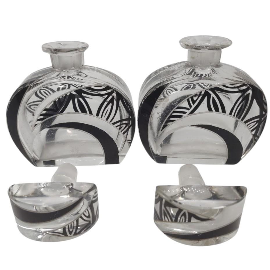 Early 20th Century Art Deco perfume bottles in cut crystal, decorated with 
