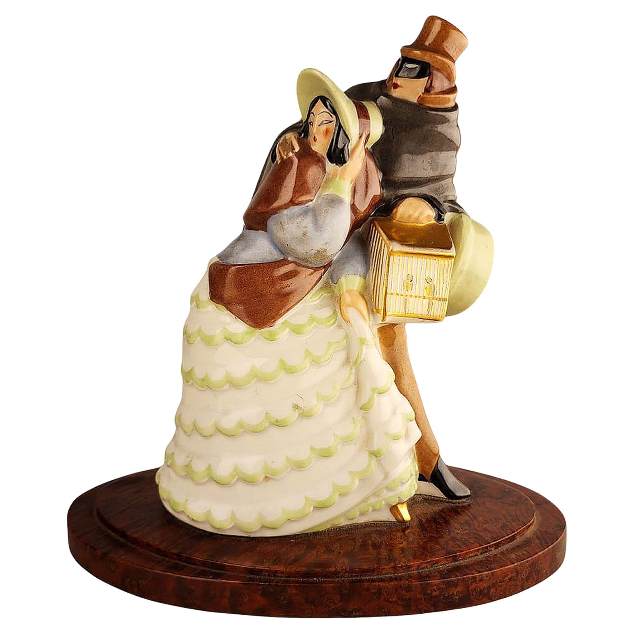Art Déco Perfume Lamp of Dressed Up Lady and Masked Man with Cloak by Argilor For Sale